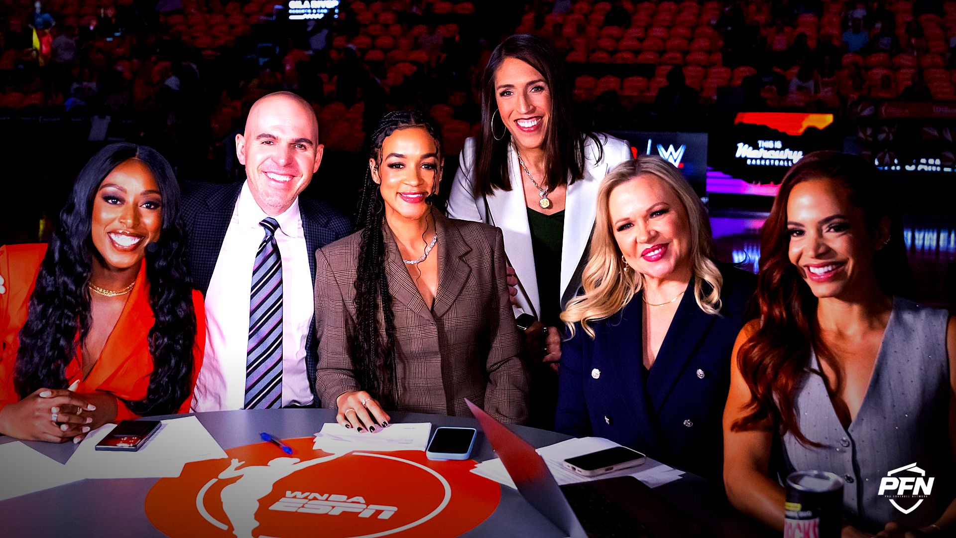 ESPN broadcast crew (from left) Chiney Ogwumike, Ryan Ruocco, Andraya Carter, Rebecca Lobo, Holly Rowe and Elle Duncan during the Phoenix Mercury against the Las Vegas Aces in game three of the 2025 WNBA Finals at PHX Arena.