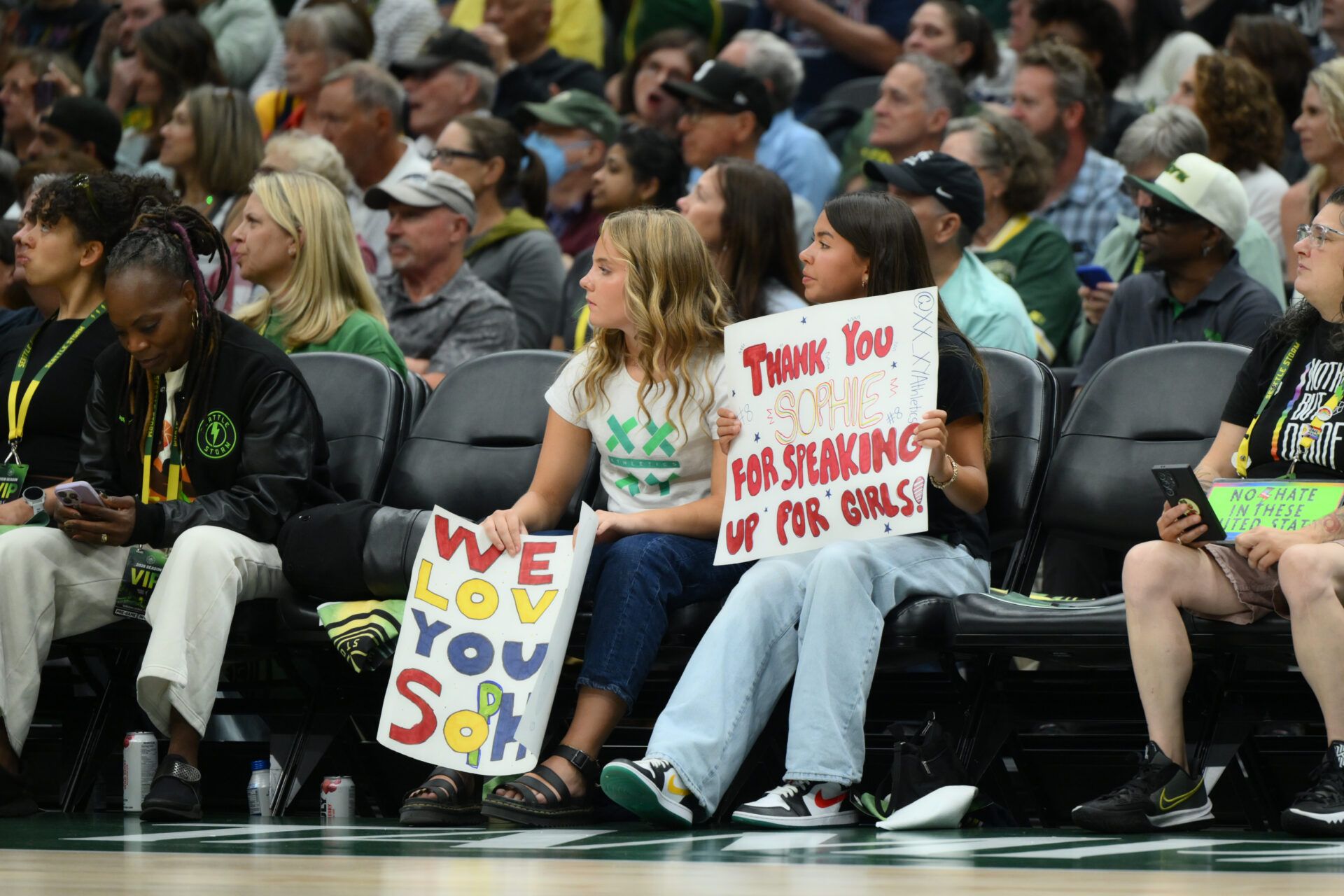 Fan hold a Indiana Fever guard Sophie Cunningham (8) (not pictured) sign during the first half between the Seattle Storm and the Indiana Fever at Climate Pledge Arena.