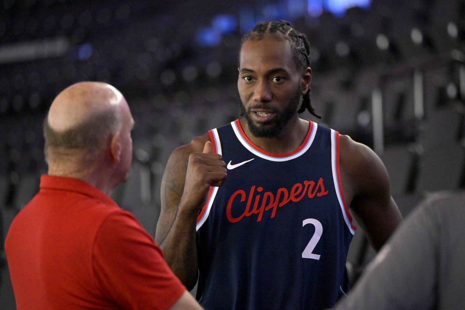 Los Angeles Clippers forward Kawhi Leonard (2) talks with team owner Steve Ballmer during media day at Intuit Dome.