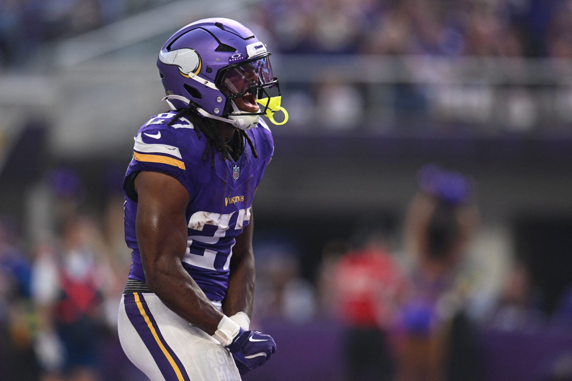 Minnesota Vikings running back Jordan Mason (27) reacts after scoring against the Cincinnati Bengals during the second half at U.S. Bank Stadium.
