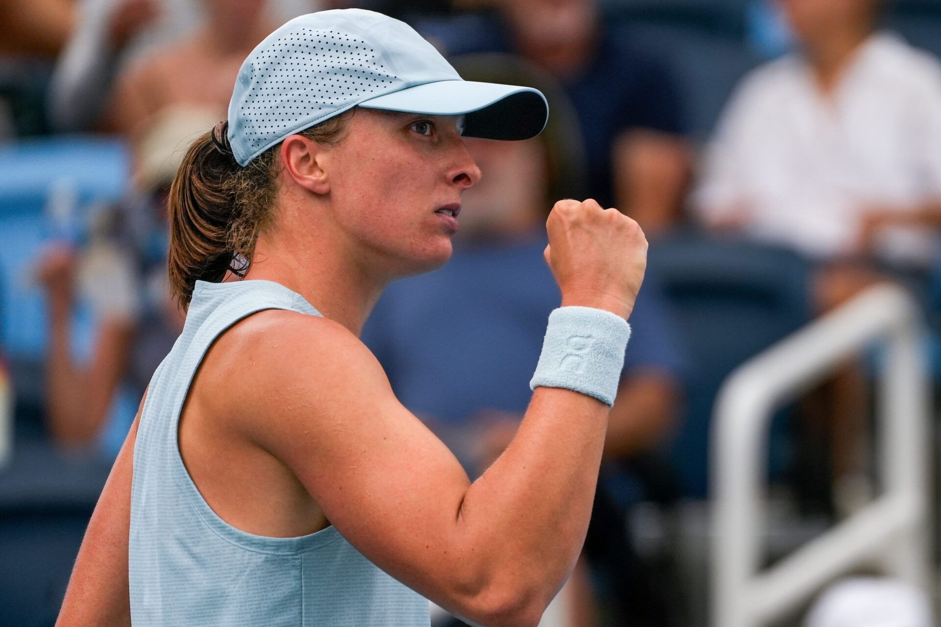 Iga Swiatek, of Poland, reacts to a point in round three of the Cincinnati Open at the Lindner Family Tennis Center in Mason, Ohio, on Monday, Aug. 17, 2026. Swiatek won in three sets, 4-6, 6-1, 6-1.