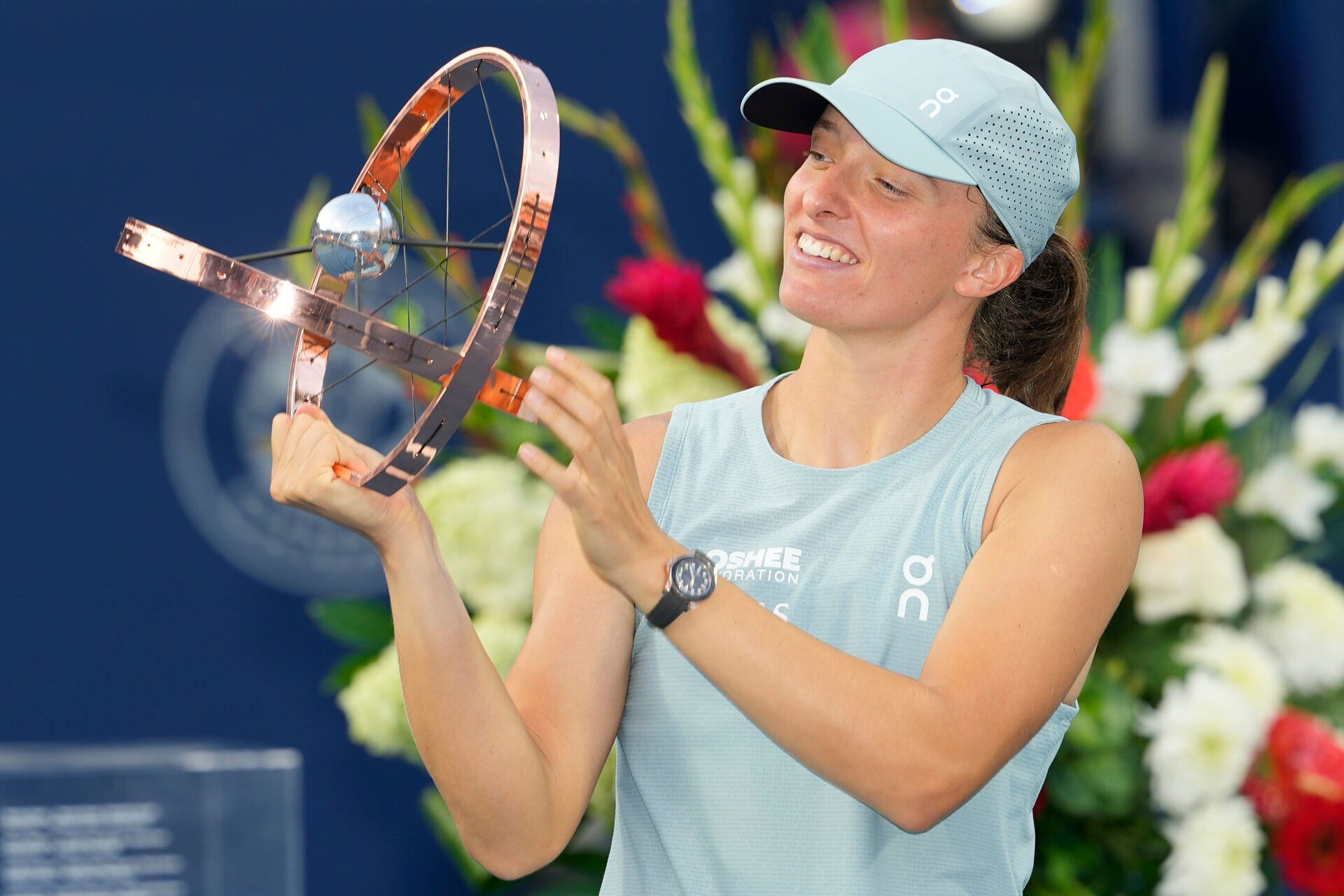 Iga Swiatek (POL) looks at the National Bank Open trophy after defeating Elena Rybakina (not pictured) during the National Bank Open final at Sobeys Stadium.