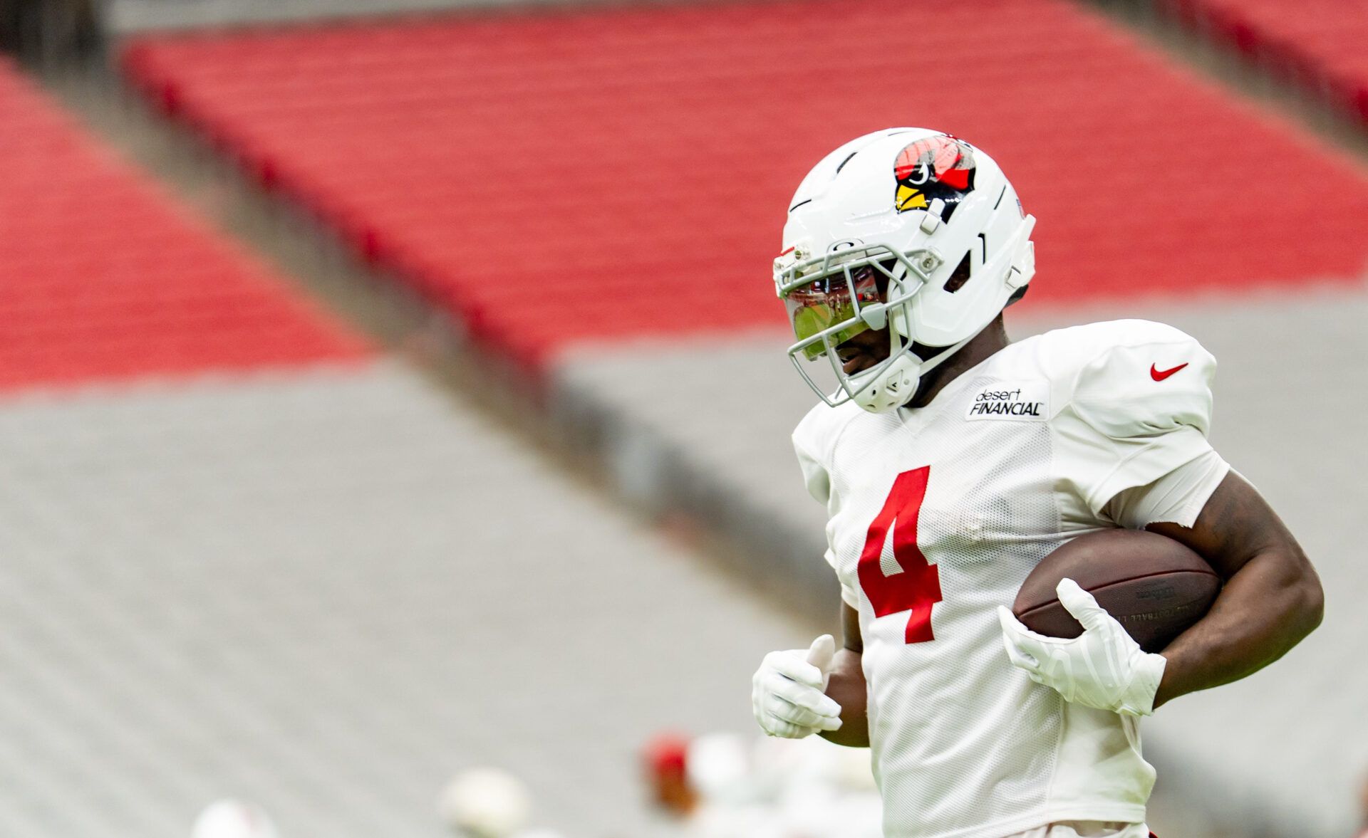 Arizona Cardinals Jeremiyah Love (4) runs with the ball during training camp at State Farm Stadium in Glendale on Aug. 11, 2026.