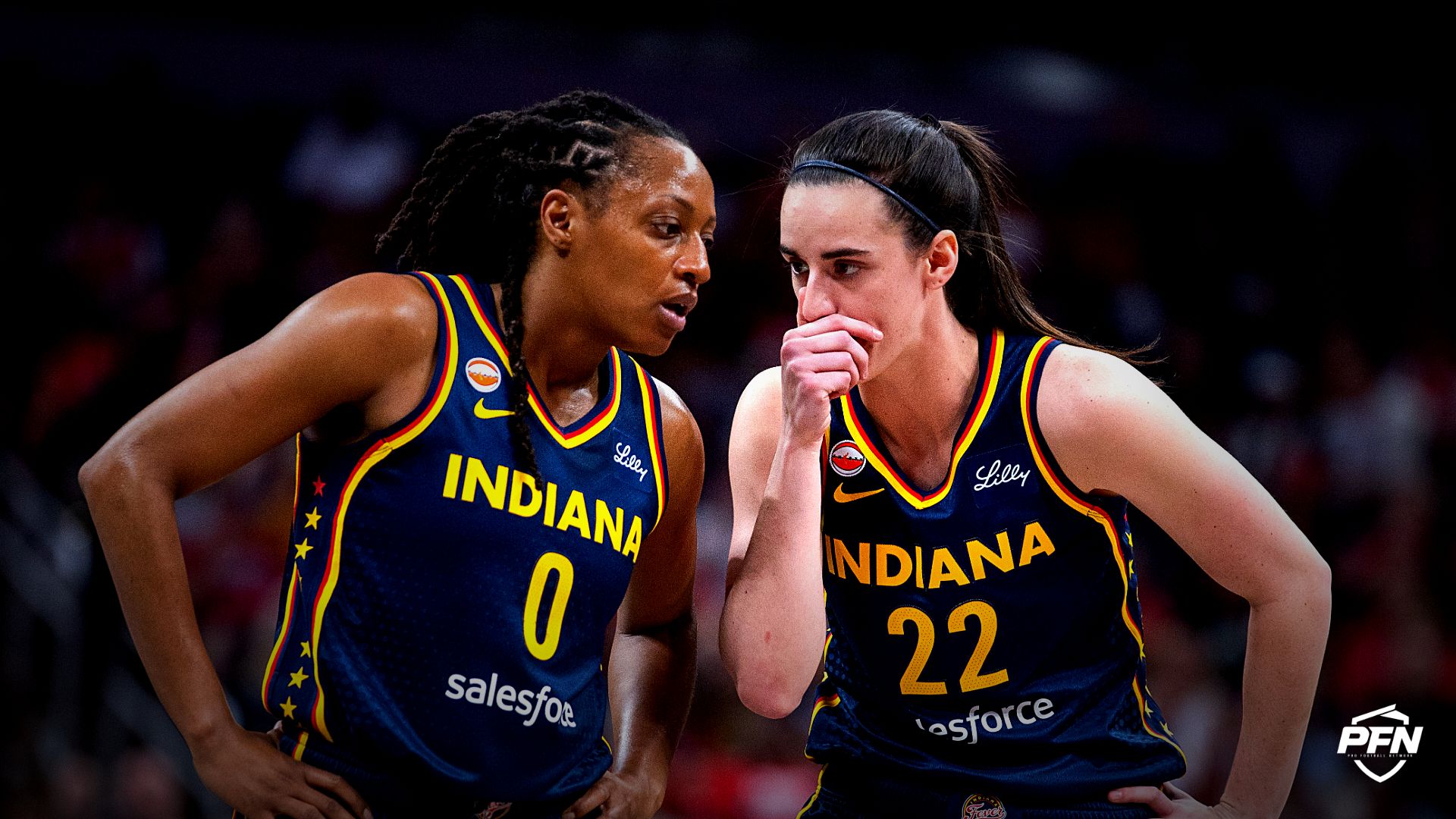 Indiana Fever guard Kelsey Mitchell (0) and guard Caitlin Clark (22) in the first half against the Chicago Sky at Gainbridge Fieldhouse.