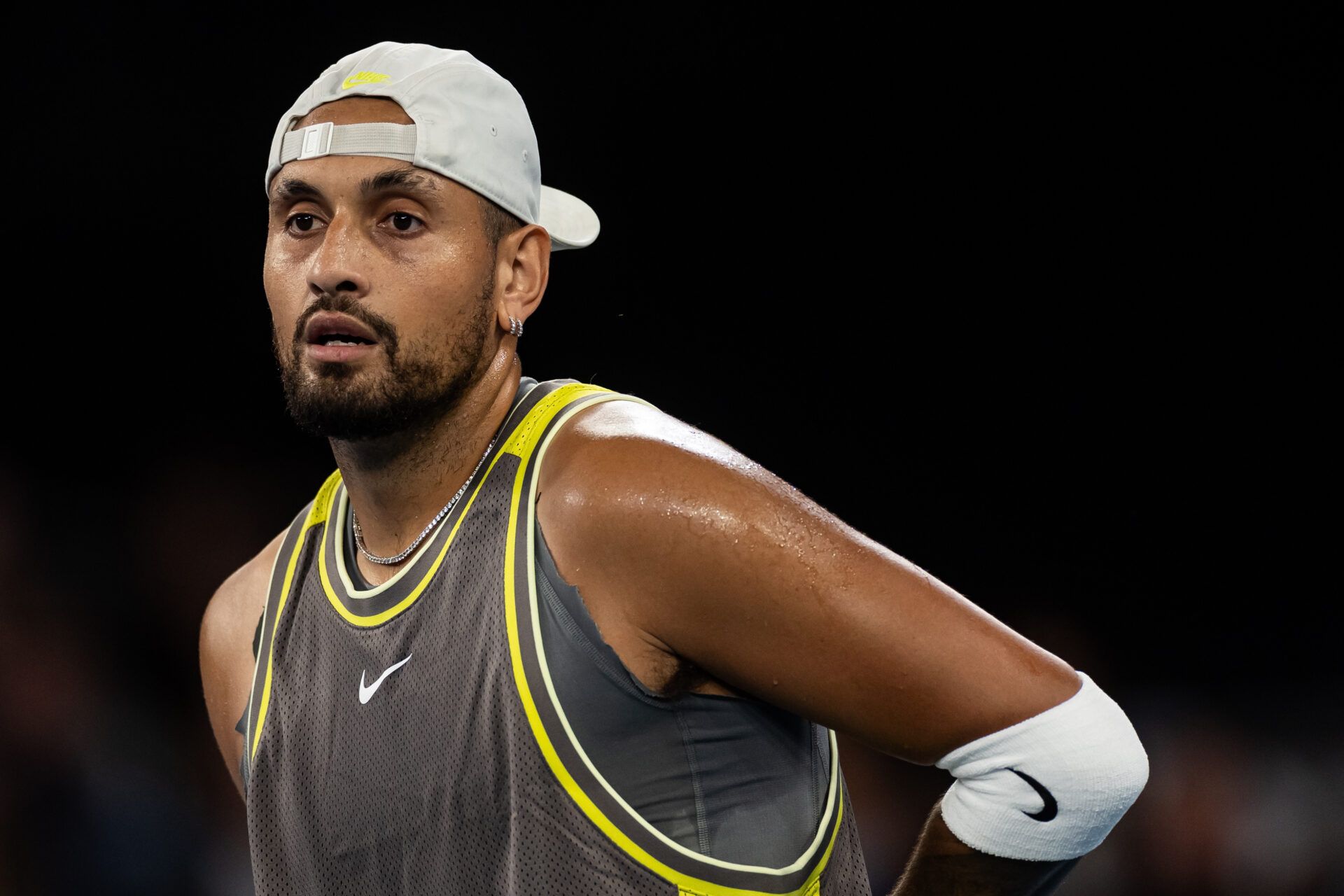 Nick Kyrgios of Australia during his match against James Duckworth of Australia and Aleksandar Vukic of Australia in the first round of the men's doubles at the 2025 Australian Open at Melbourne Park.