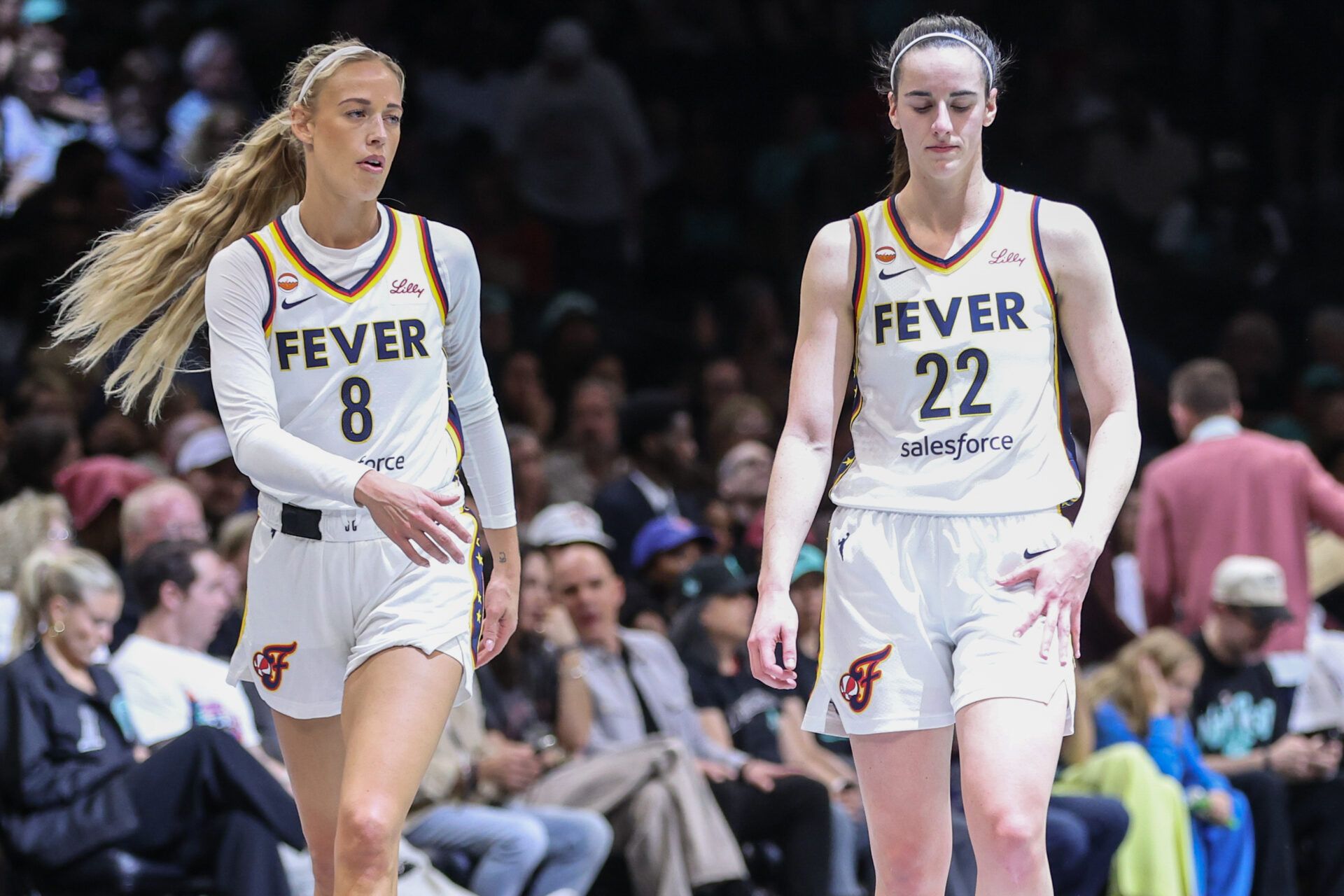 Indiana Fever guards Sophie Cunningham (8) and Caitlin Clark (22) at Barclays Center.