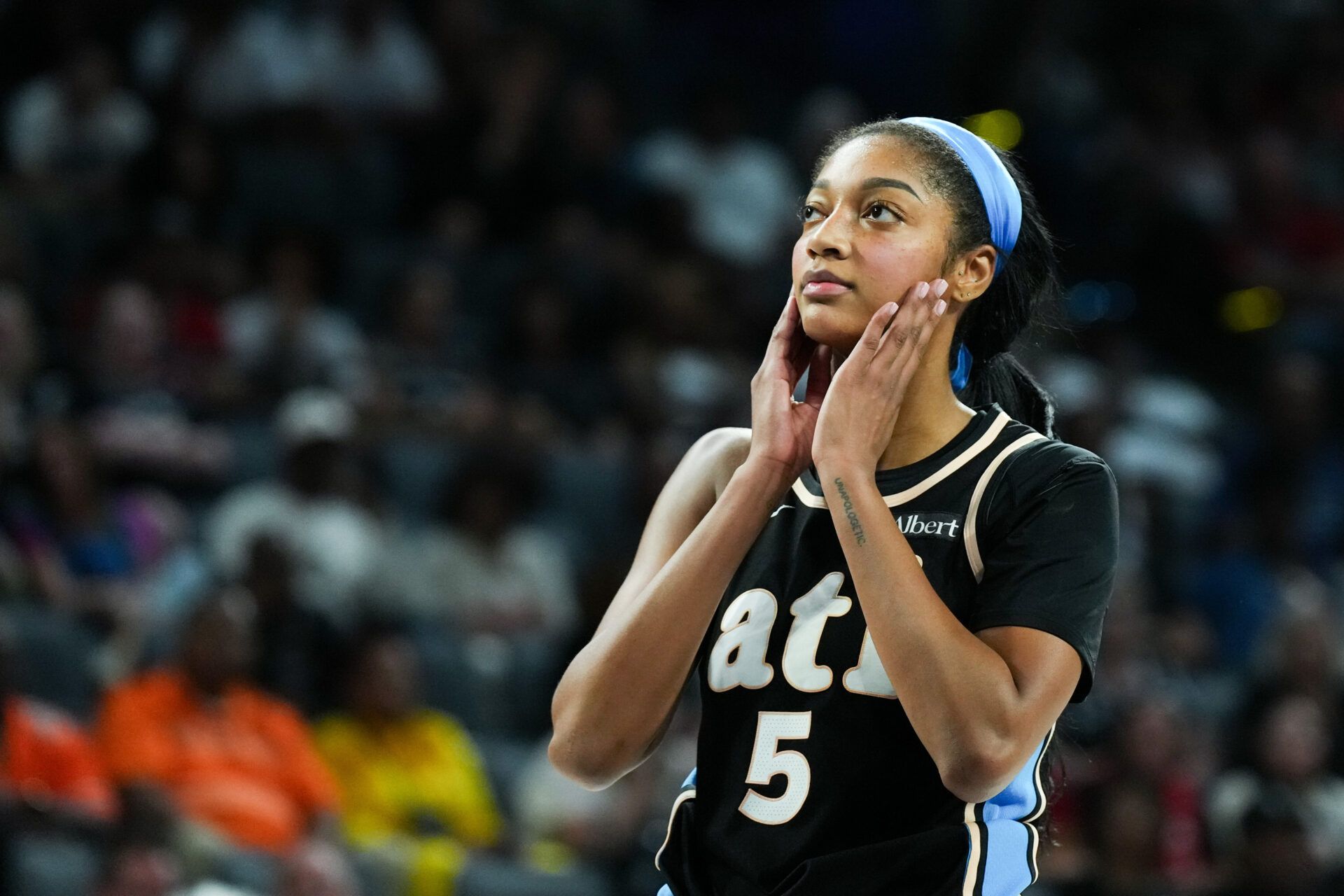 Atlanta Dream forward Angel Reese (5) reacts to a foul in the fourth quarter against the Las Vegas Aces at Michelob Ultra Arena.