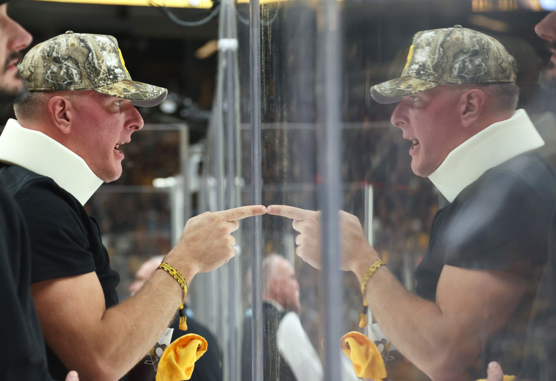Media personality Pat McAfee reacts to a Philadelphia Flyers player against the Pittsburgh Penguins during the third period in game two of the first round of the 2026 Stanley Cup Playoffs at PPG Paints Arena.
