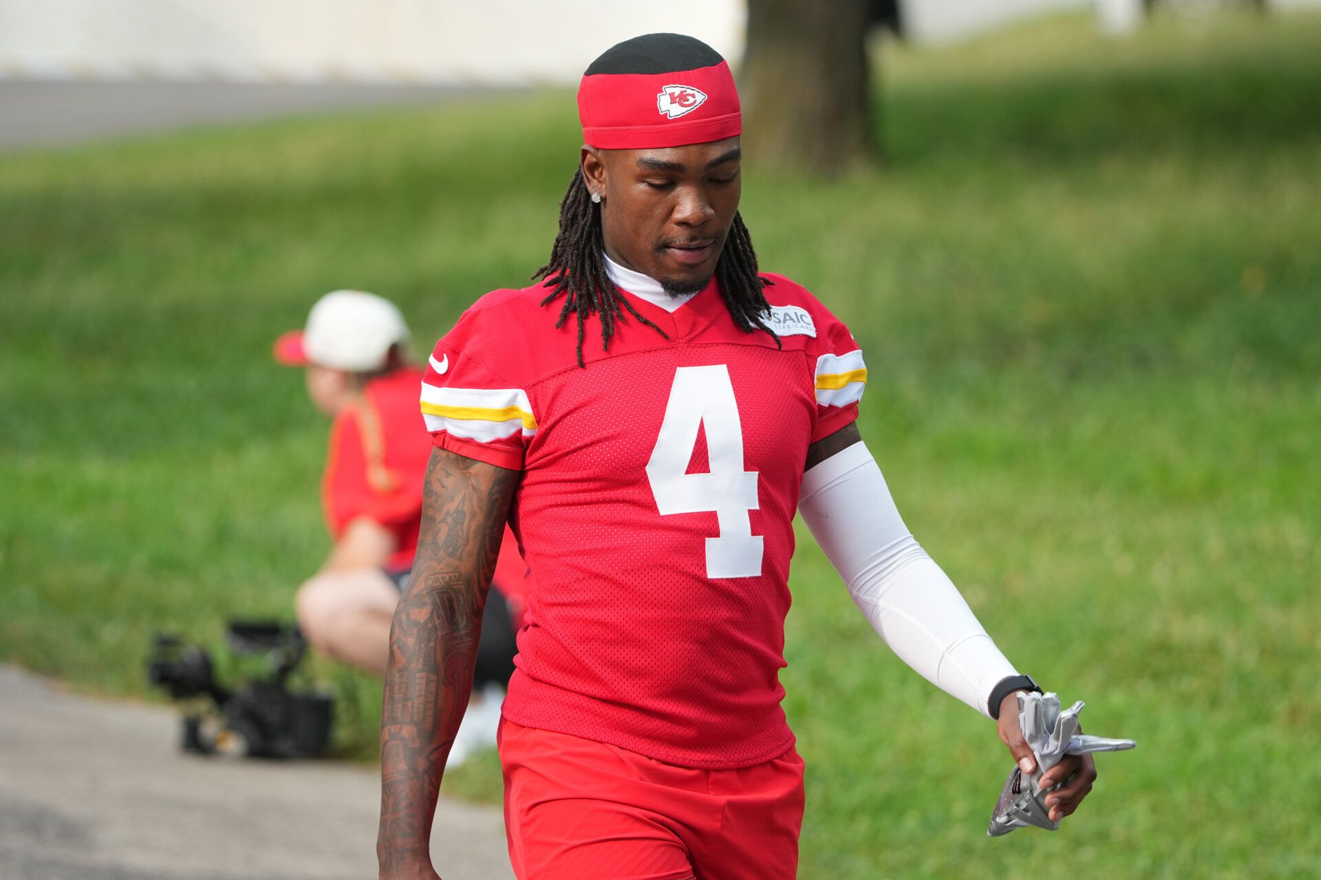 Kansas City Chiefs wide receiver Rashee Rice (4) walks down the hill to the practice fields during training camp at Missouri Western State University.