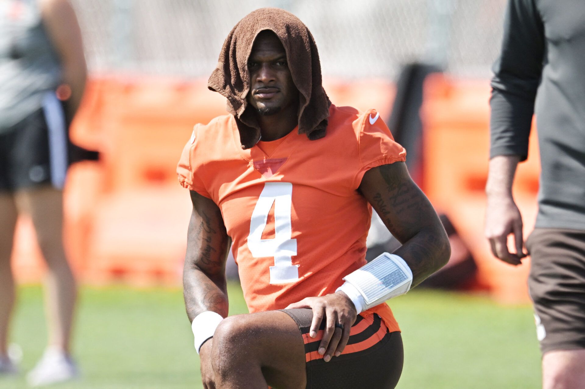 Cleveland Browns quarterback Deshaun Watson (4) stretches during minicamp at CrossCountry Mortgage Campus.
