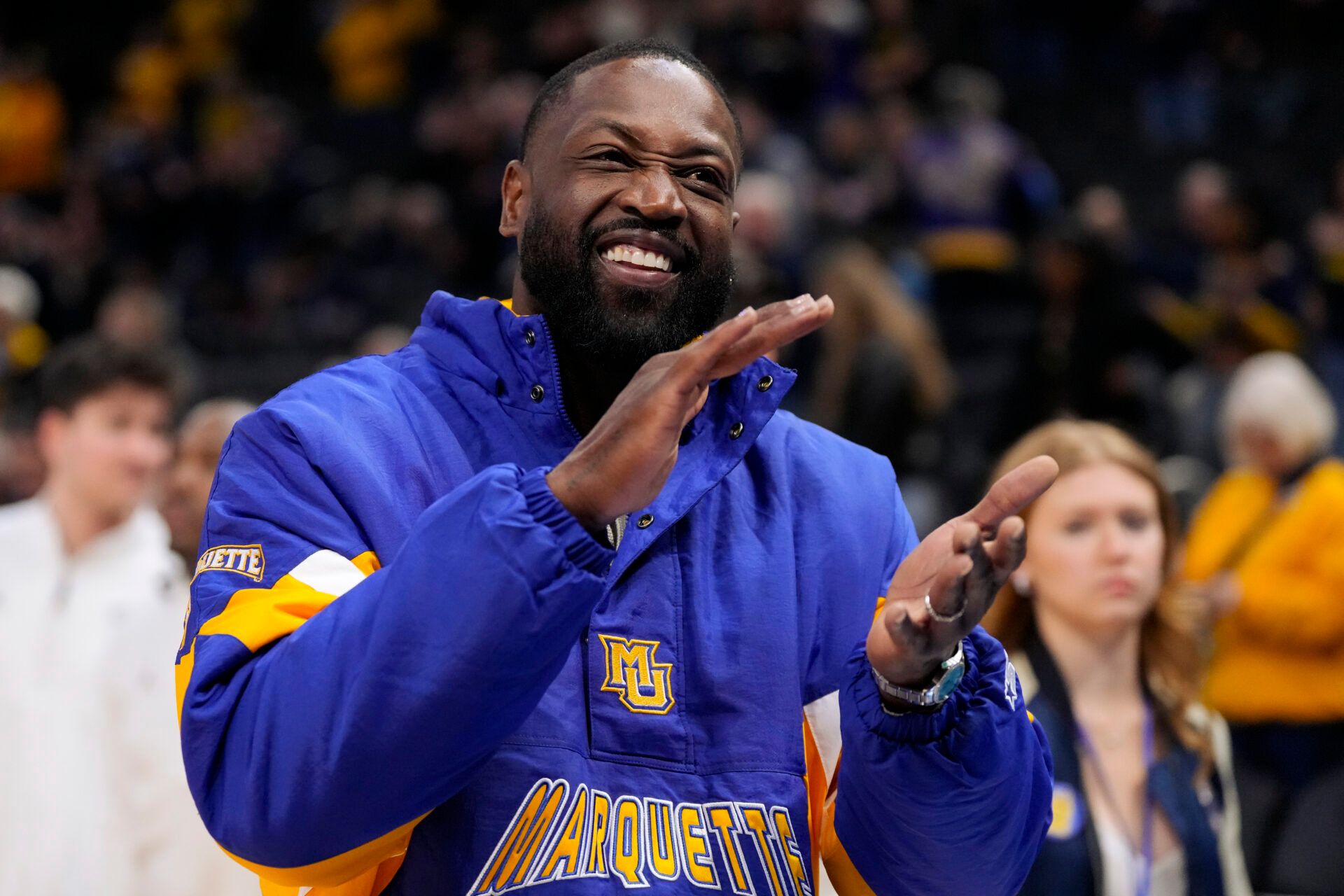 Former Marquette player Dwyane Wade looks on prior to the game against the Butler Bulldogs at Fiserv Forum.