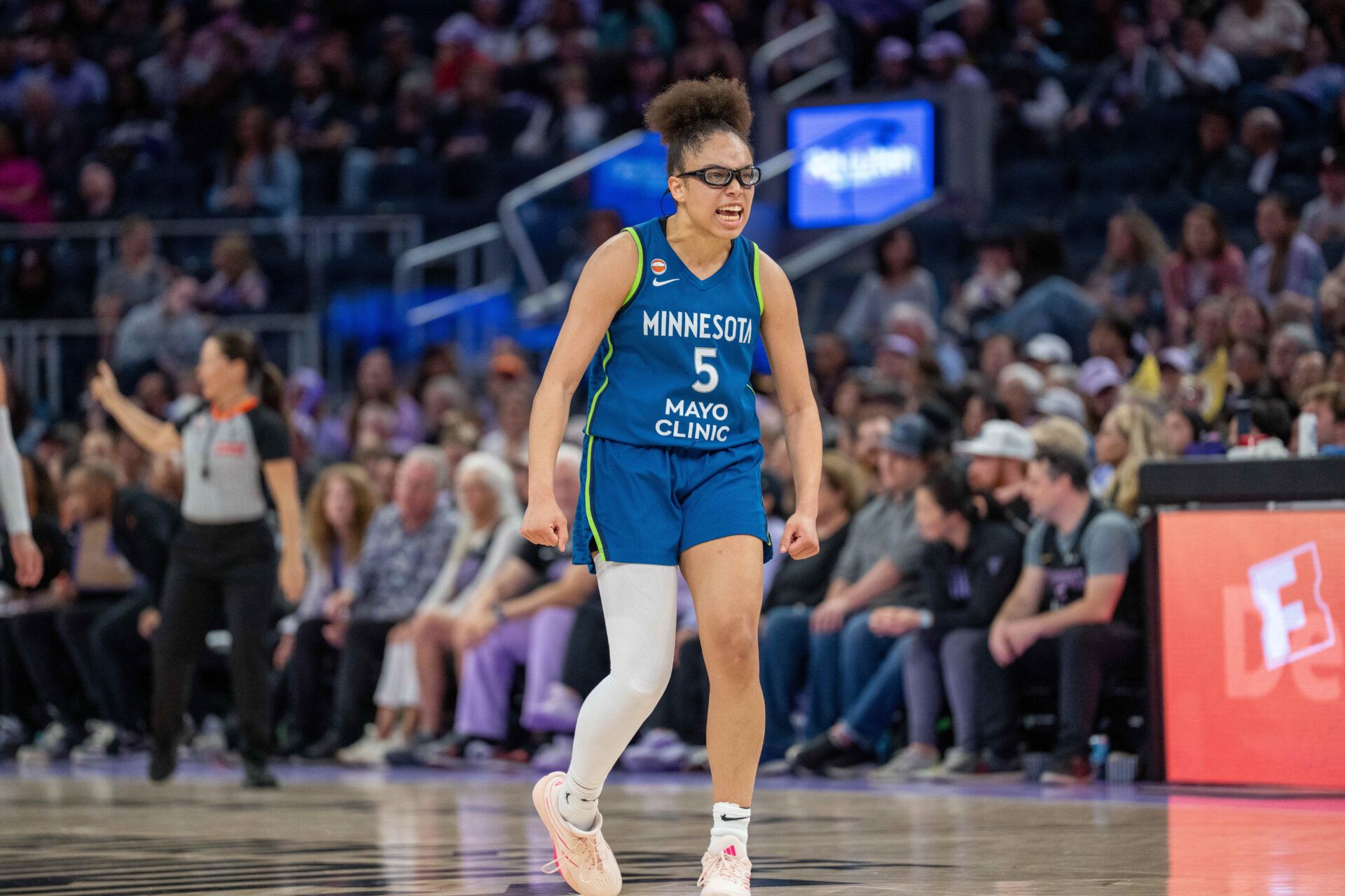 Minnesota Lynx guard Olivia Miles (5) celebrates after the three point basket during the fourth quarter against the Golden State Valkyries at Chase Center.