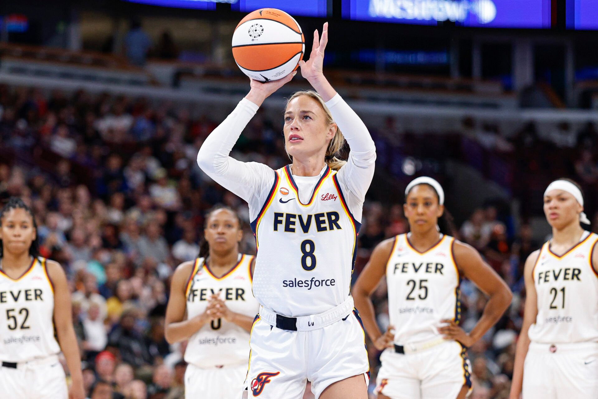 Indiana Fever guard Sophie Cunningham (8) shoots a free throw against the Chicago Sky during the first half of a WNBA game at United Center.