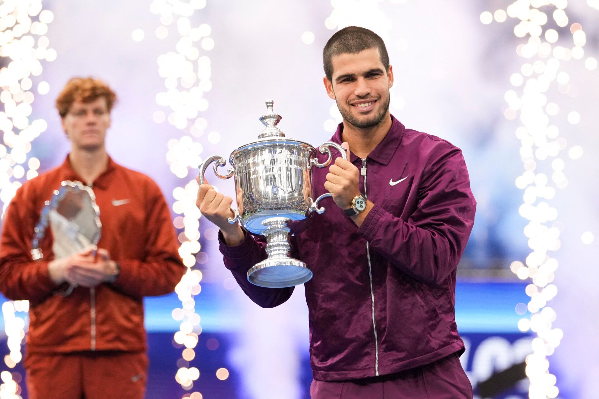 Carlos Alcaraz (ESP) holds the trophy after defeating Jannik Sinner (ITA) in the final of mens singles at Billie Jean King National Tennis Center.