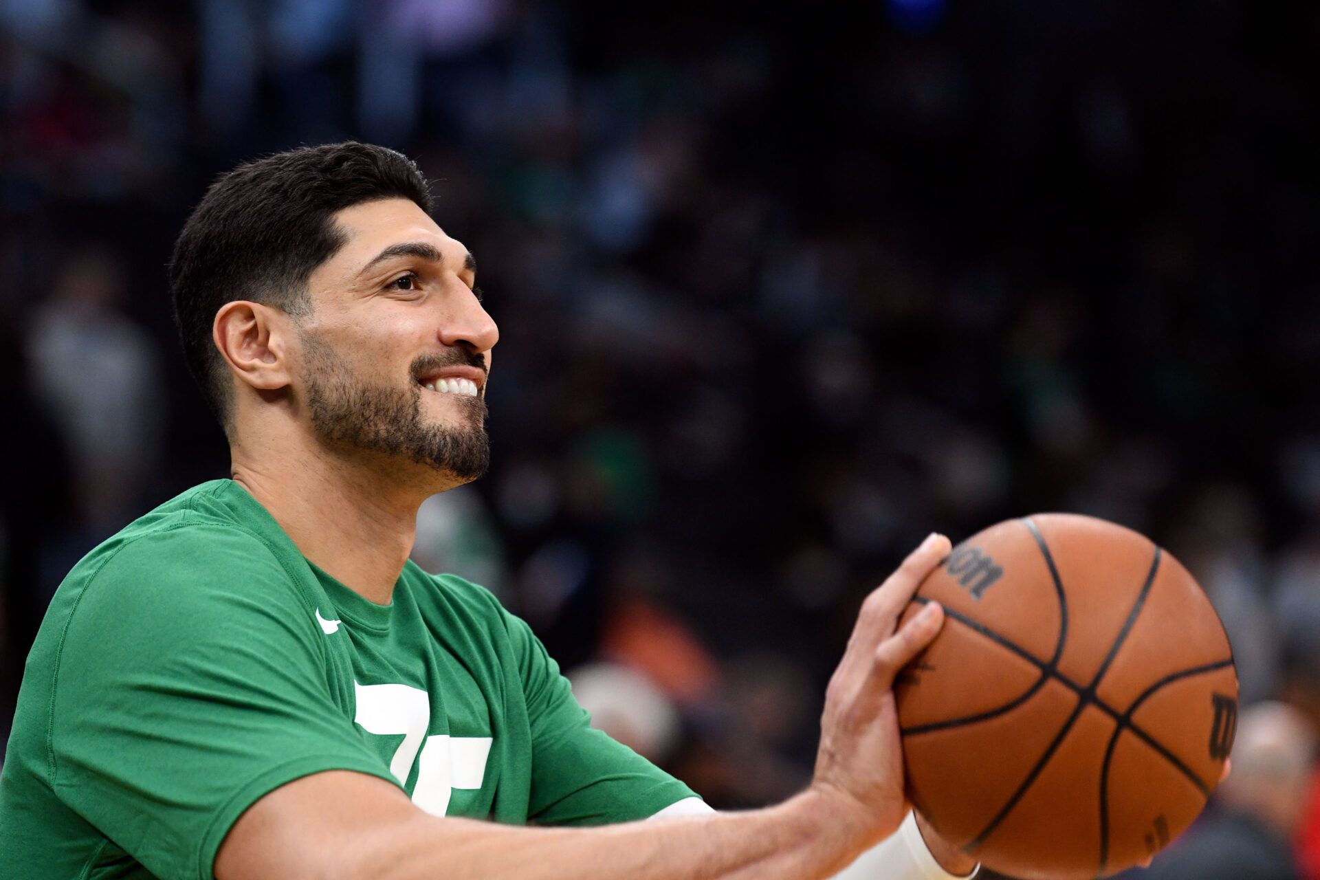 Boston Celtics center Enes Kanter (13) warms-up before a game against the Toronto Raptors during the first half at the TD Garden.