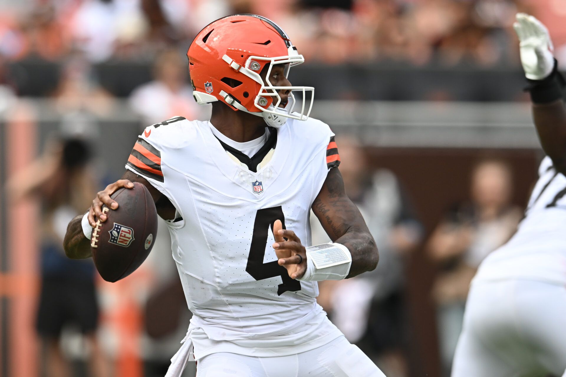 Cleveland Browns quarterback Deshaun Watson (4) looks to pass during the second half against the Buffalo Bills at Huntington Bank Field.
