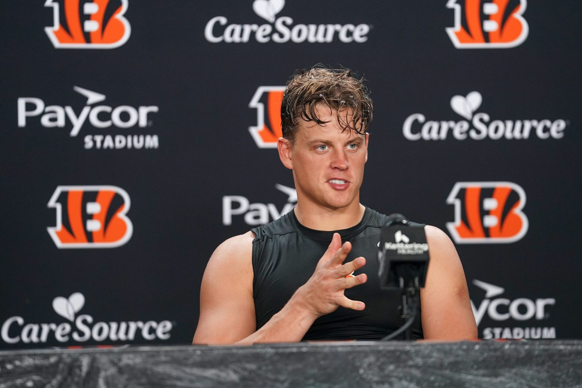 Cincinnati Bengals Joe Burrow answers questions from media during a press conference after practice at Paycor Stadium, Thursday, Aug. 20, 2026, in downtown Cincinnati.