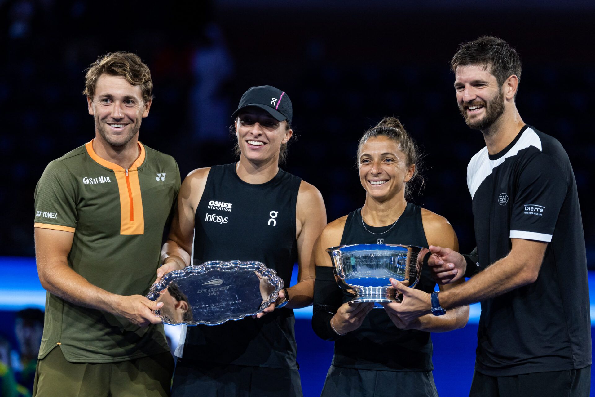 Sara Errani of Italy and Andrea Vavassori of Italy pose with the winner’s trophy after their victory over Casper Ruud of Norway and Ina Swiatek of Poland who pose with the runner up’s trophy after the final of the mixed doubles tournament at the US Open at Arthur Ashe Stadium.