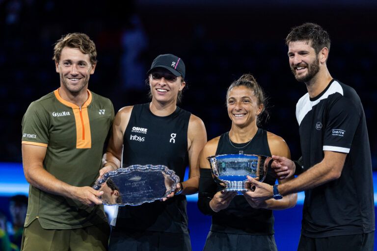 Sara Errani of Italy and Andrea Vavassori of Italy pose with the winner’s trophy after their victory over Casper Ruud of Norway and Ina Swiatek of Poland who pose with the runner up’s trophy after the final of the mixed doubles tournament at the US Open at Arthur Ashe Stadium.