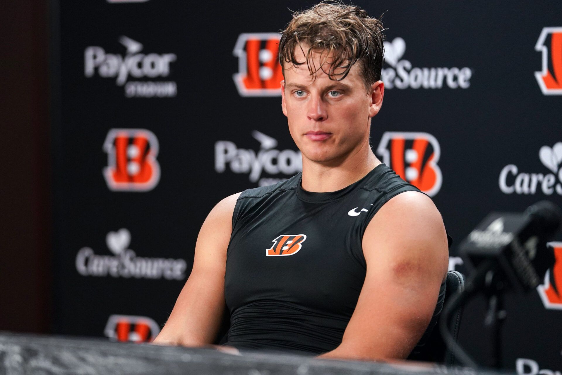 Cincinnati Bengals Joe Burrow takes questions from media during a press conference after practice at Paycor Stadium, Thursday, Aug. 20, 2026, in downtown Cincinnati.
