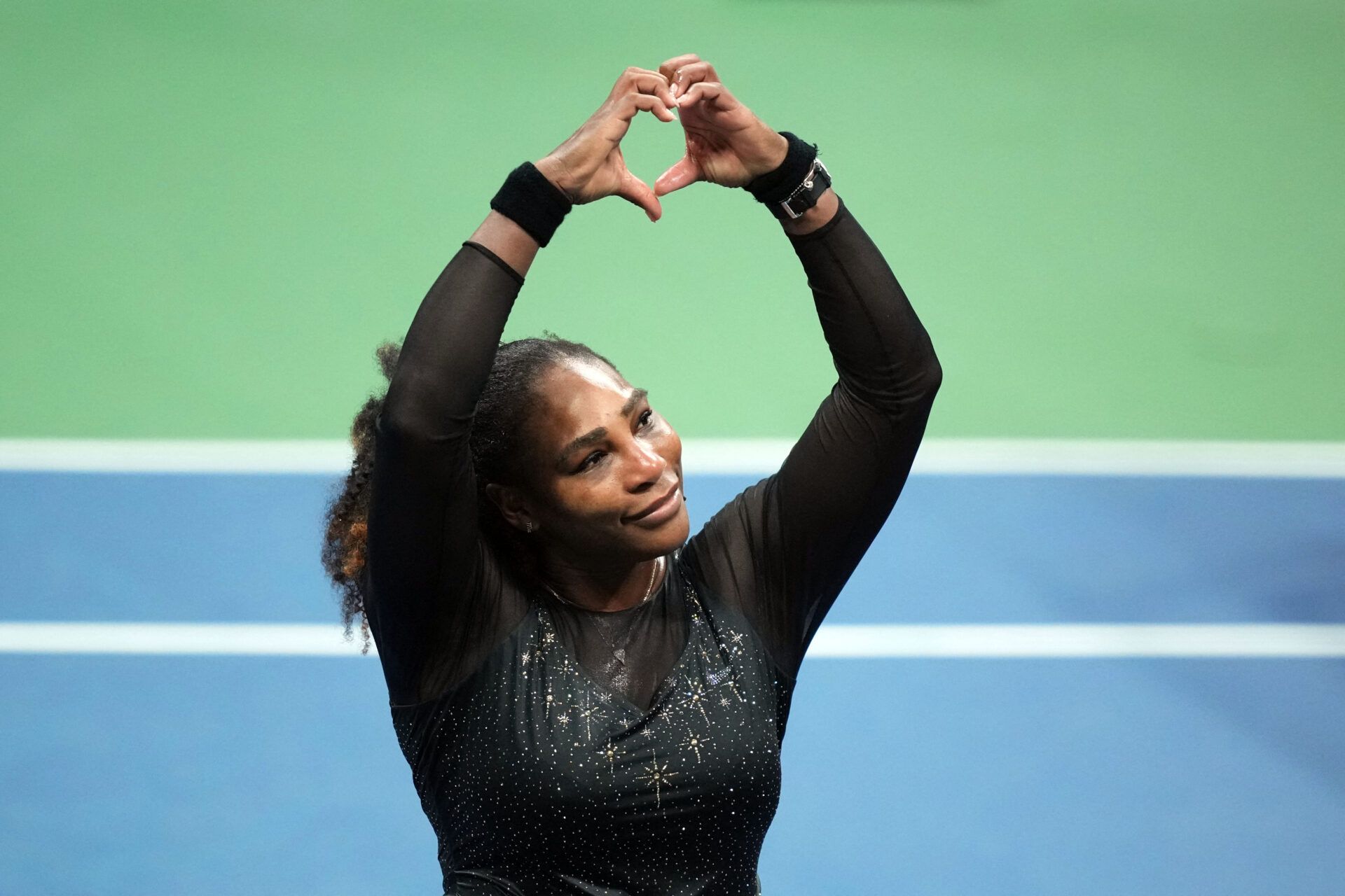 Serena Williams of the United States gestures to the crowd after a match against Ajla Tomljanovic of Australia on day five of the 2022 U.S. Open tennis tournament at USTA Billie Jean King Tennis Center.