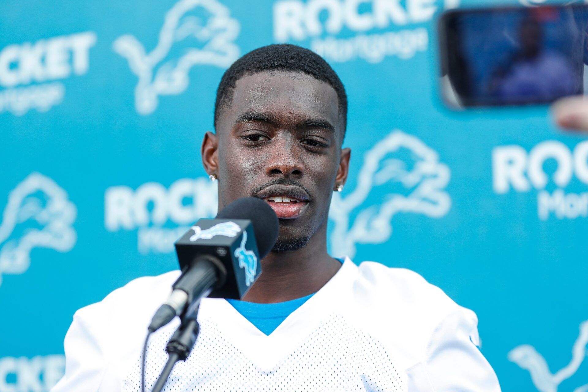 Detroit Lions cornerback Terrion Arnold (0) answers a question during rookie minicamp at Detroit Lions headquarters and practice facility in Allen Park on Friday, May 10, 2024.