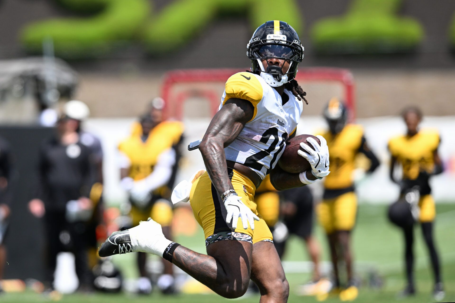 Pittsburgh Steelers running back Kaleb Johnson (20) runs during a practice session at Training camp at Saint Vincent College.