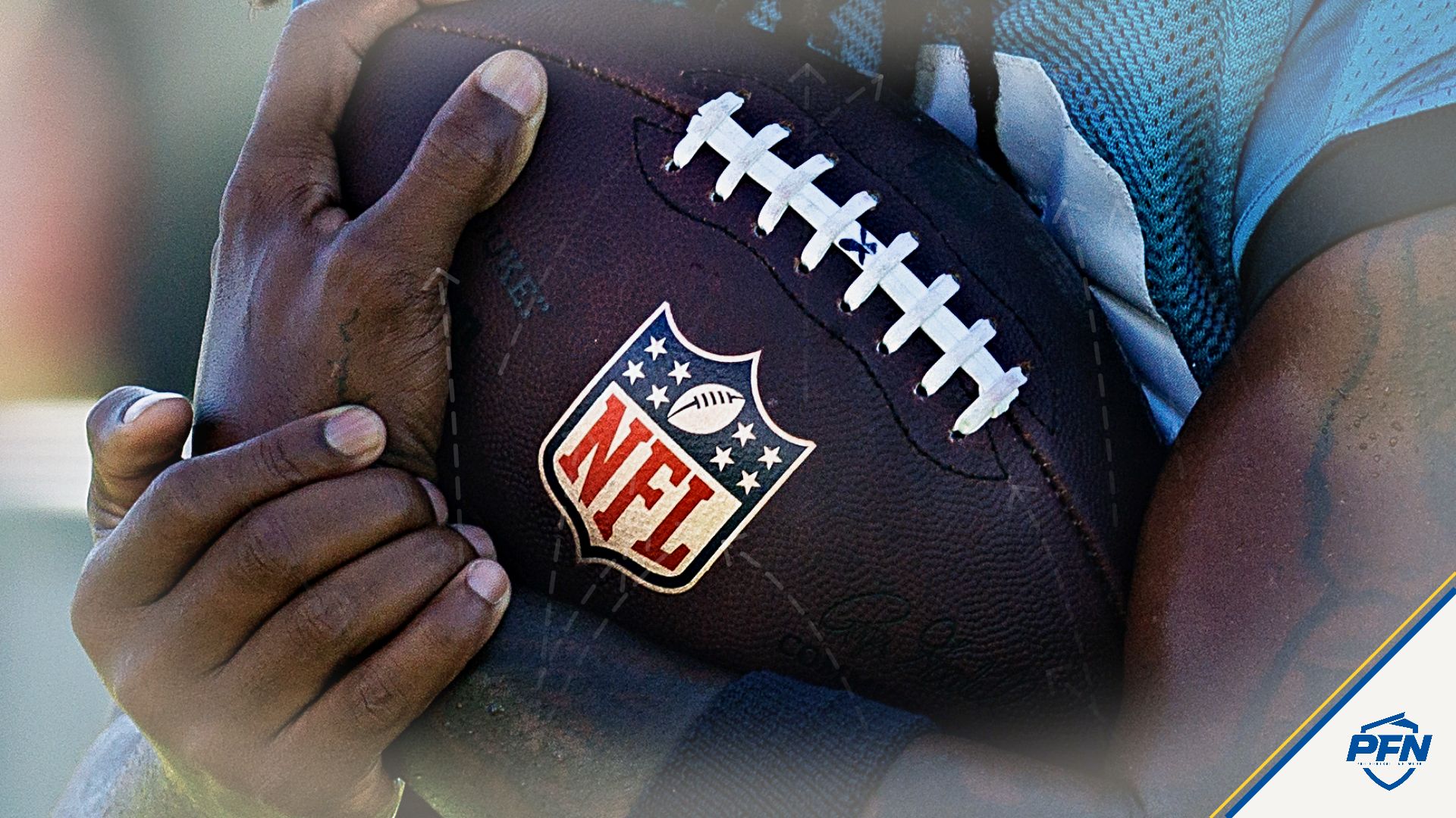 Detailed view of the NFL logo on the football during a joint scrimmage between the New Orleans Saints and the Jacksonville Jaguars during at Ochsner Sports Performance Center.
