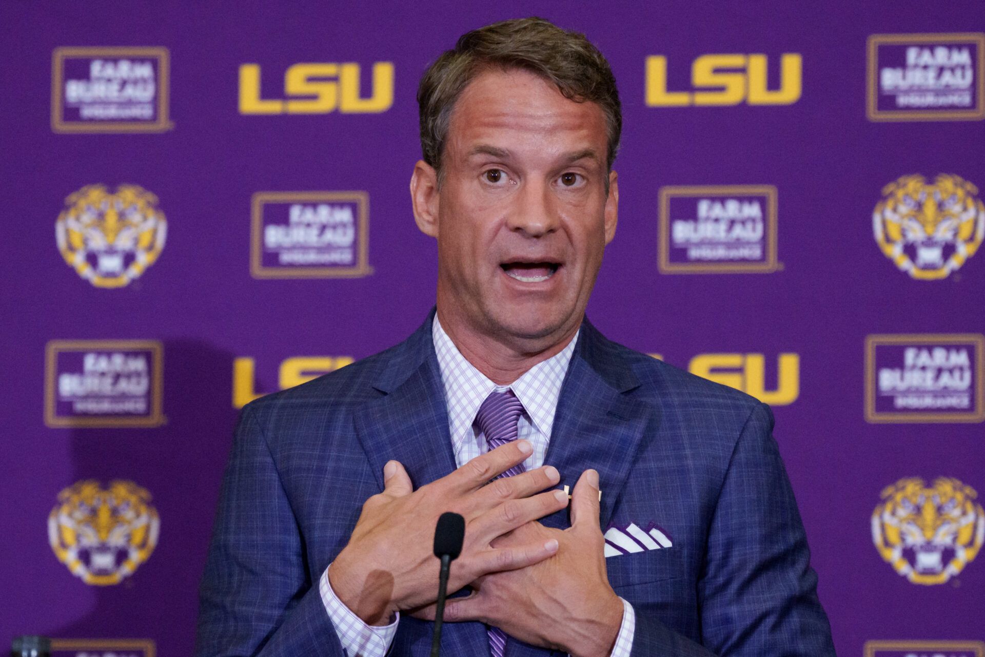 LSU new head coach Lane Kiffin speaks at South Stadium Club at Tiger Stadium.