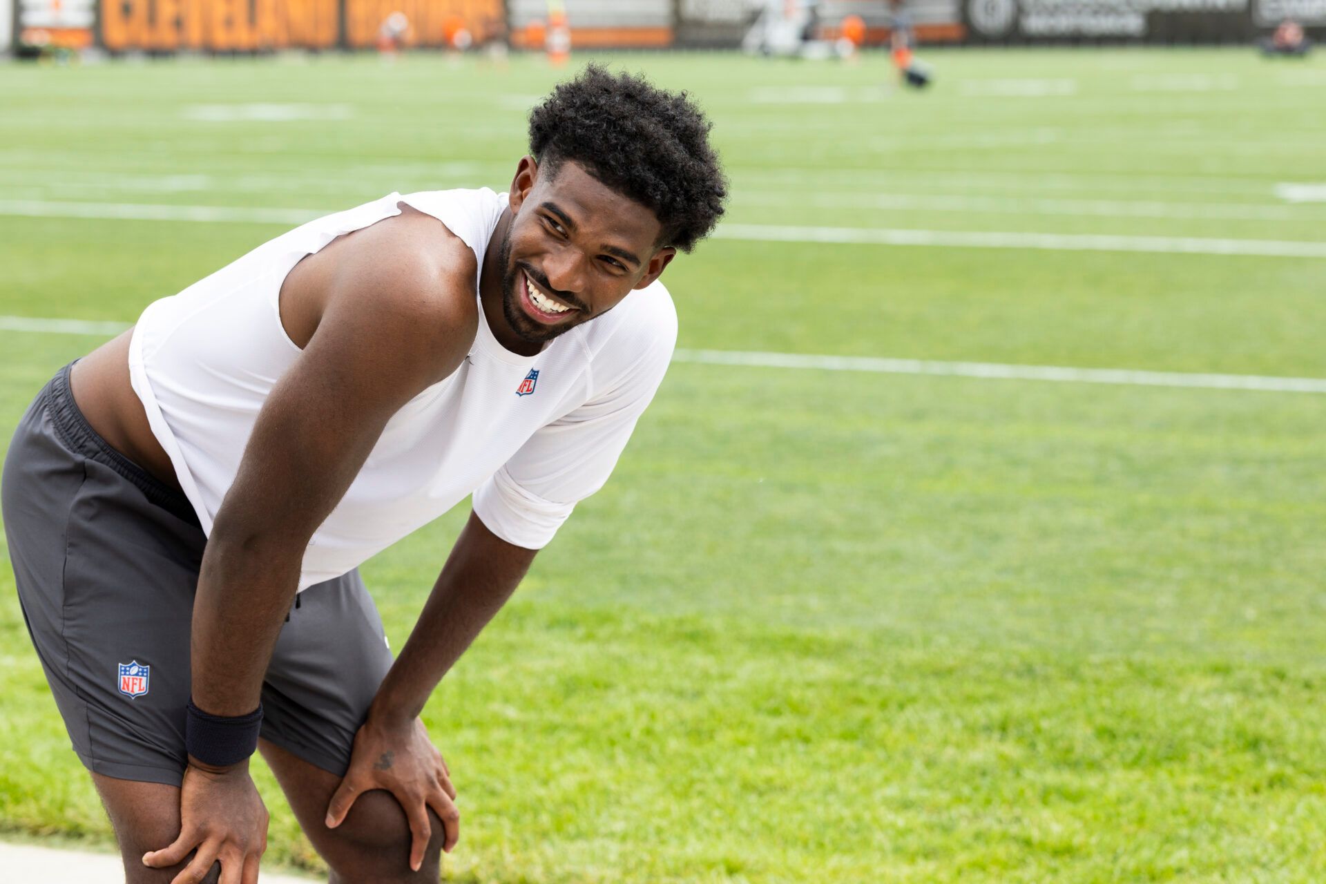 Cleveland Browns quarterback Shedeur Sanders (2) laughs after mandatory mini camp at Cross Country Mortgage Campus.
