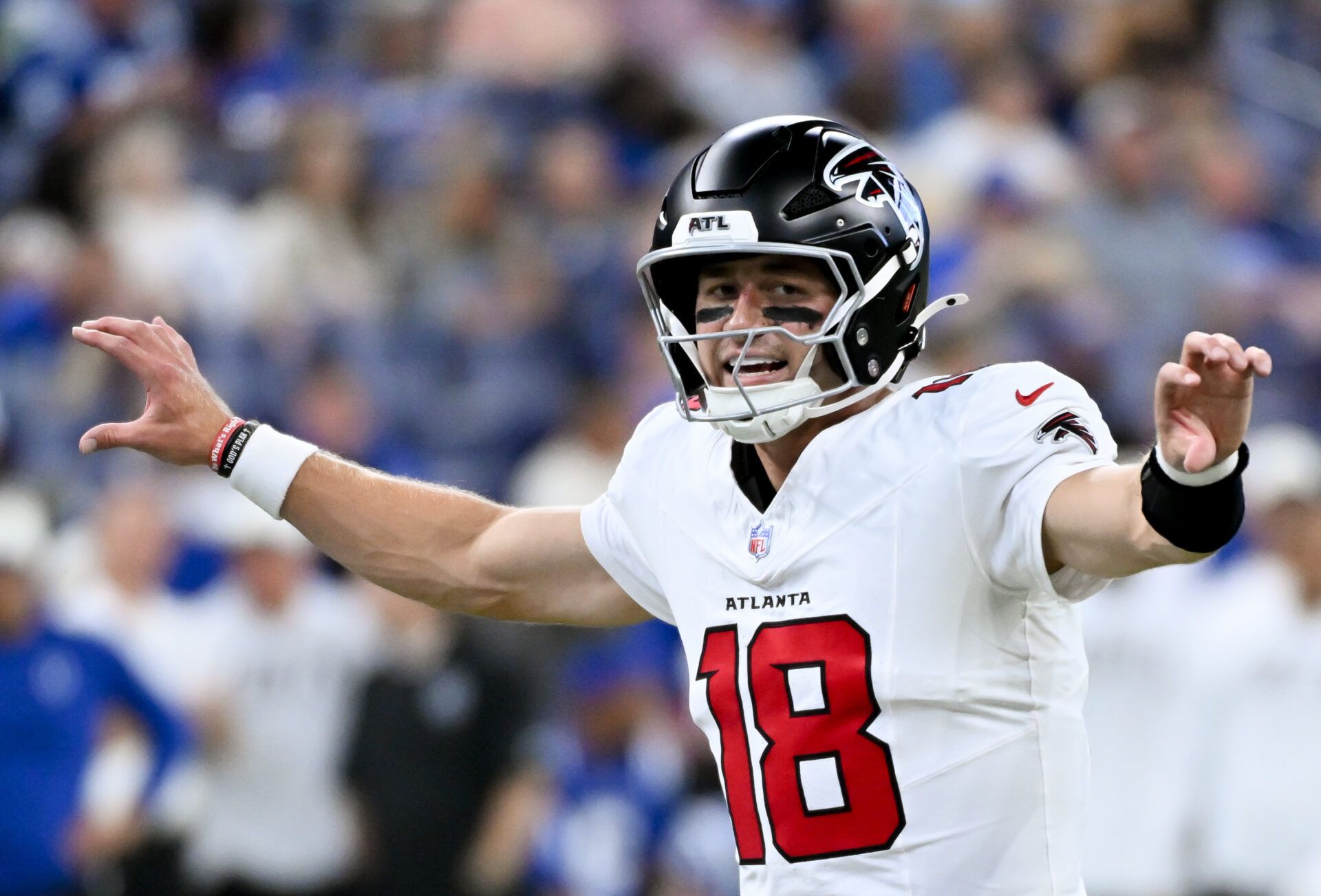 Atlanta Falcons quarterback Jack Strand (18) initiates the offense against the Indianapolis Colts during the second half at Lucas Oil Stadium.