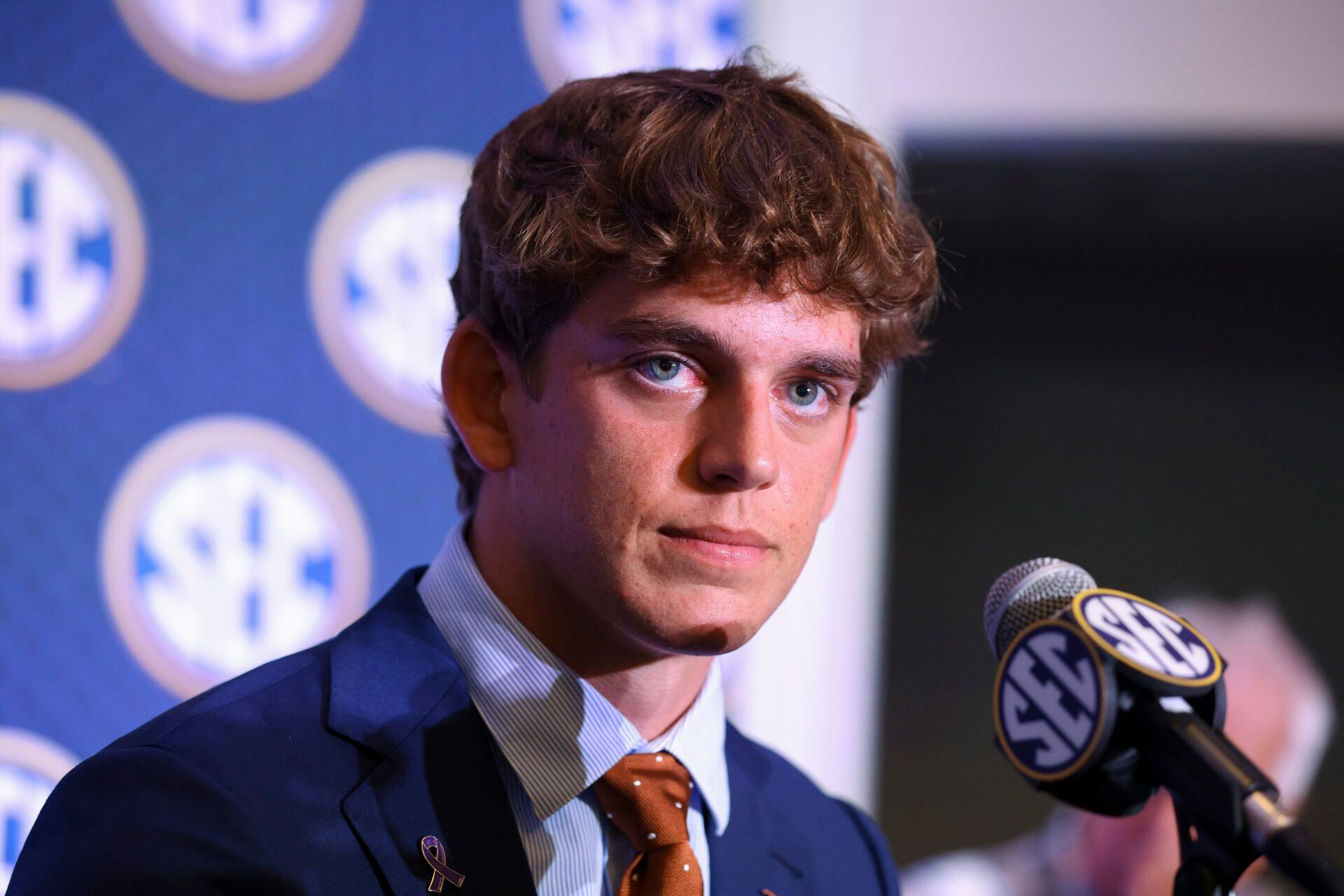 Texas Longhorns quarterback Arch Manning (16) speaks to the press during SEC Football Kickoff Media Day at the Tampa Marriott.