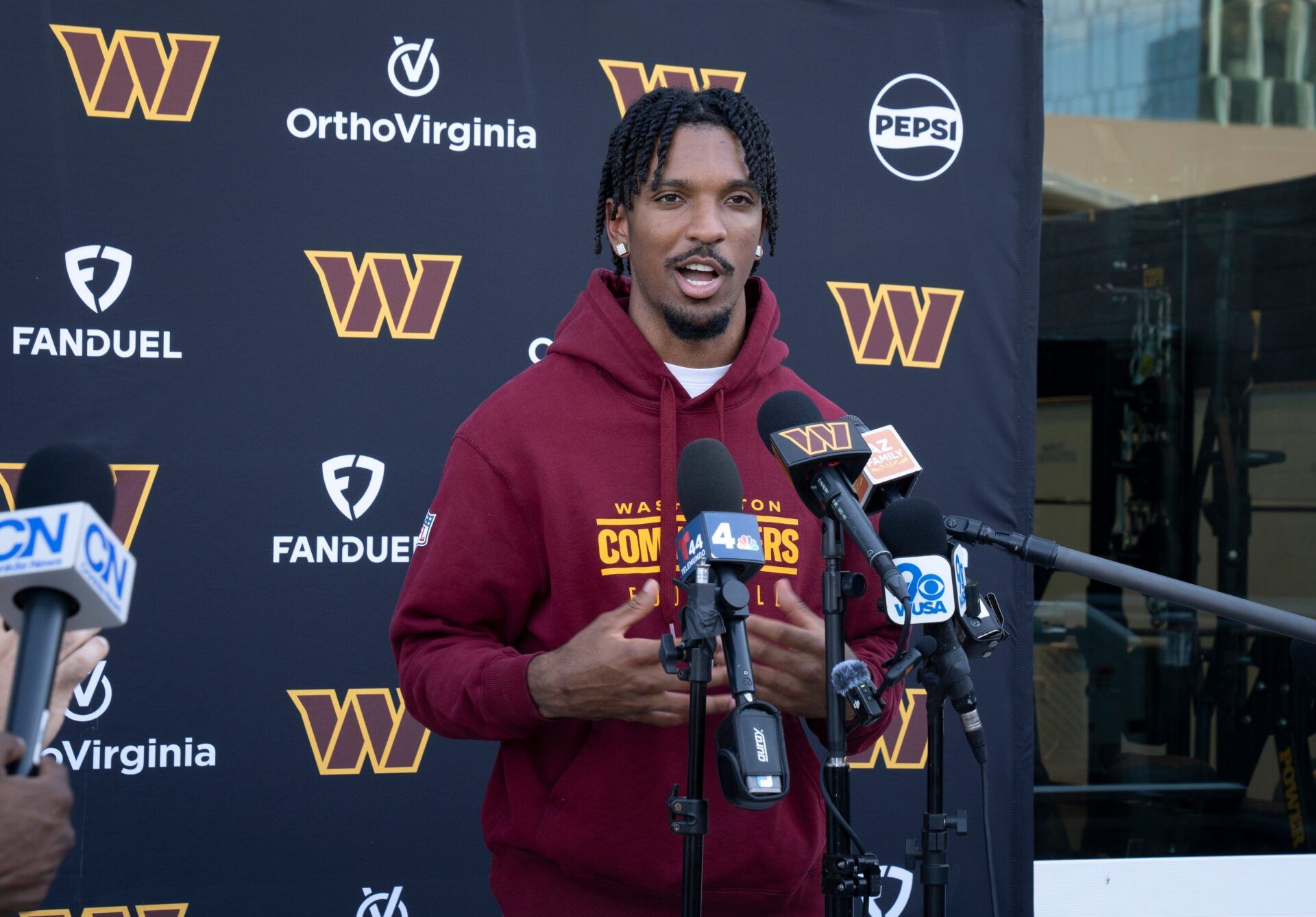 Washington Commanders quarterback Jayden Daniels answers questions during a news conference on Sept. 25, 2024, at ASUs Student Athletic Facility in Tempe.