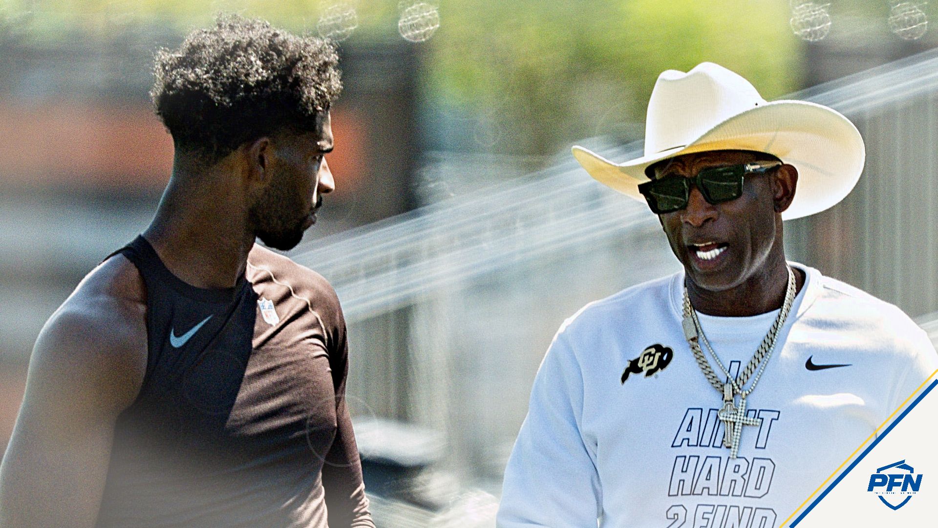 Deion Sanders spends time with his son, Cleveland Browns quarterback Shedeur Sanders (2) at the conclusion of the second day of training camp, July 30, 2026, in Berea, Ohio.
