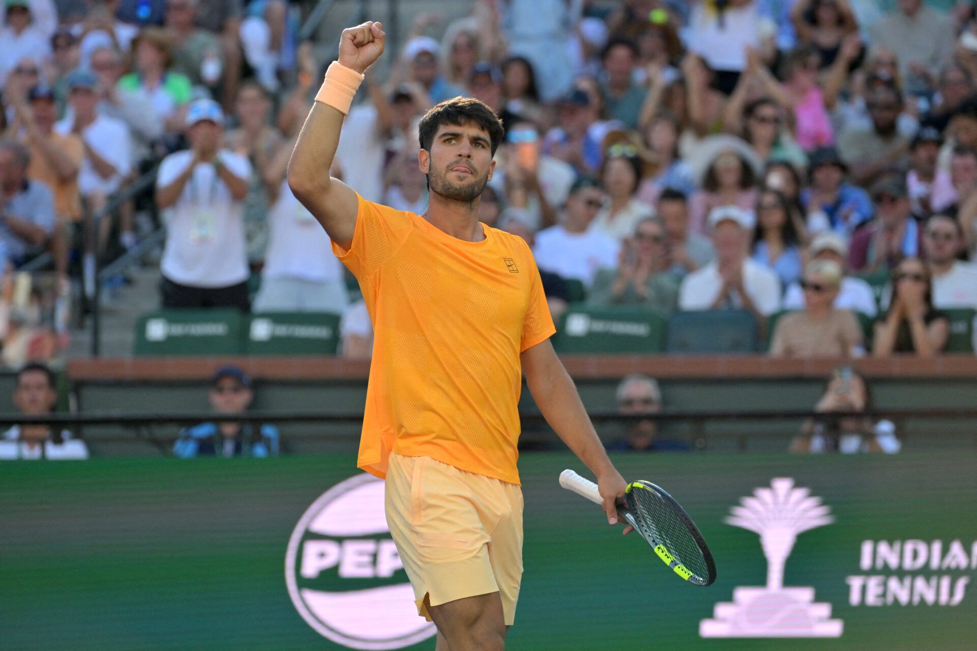 Carlos Alcaraz (ESP) reacts to the crowd cheering after winning a point during his semifinal match against Daniil Medvedev (RUS) in the BNP Paribas Open at the Indian Wells Tennis Garden.