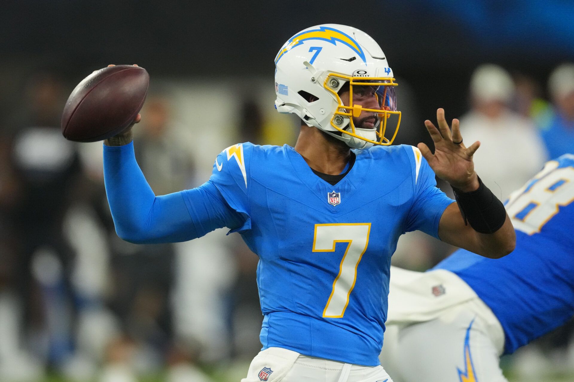 Los Angeles Chargers quarterback DJ Uiagalelei (7) throws the ball against the San Francisco 49ers in the second half at SoFi Stadium.