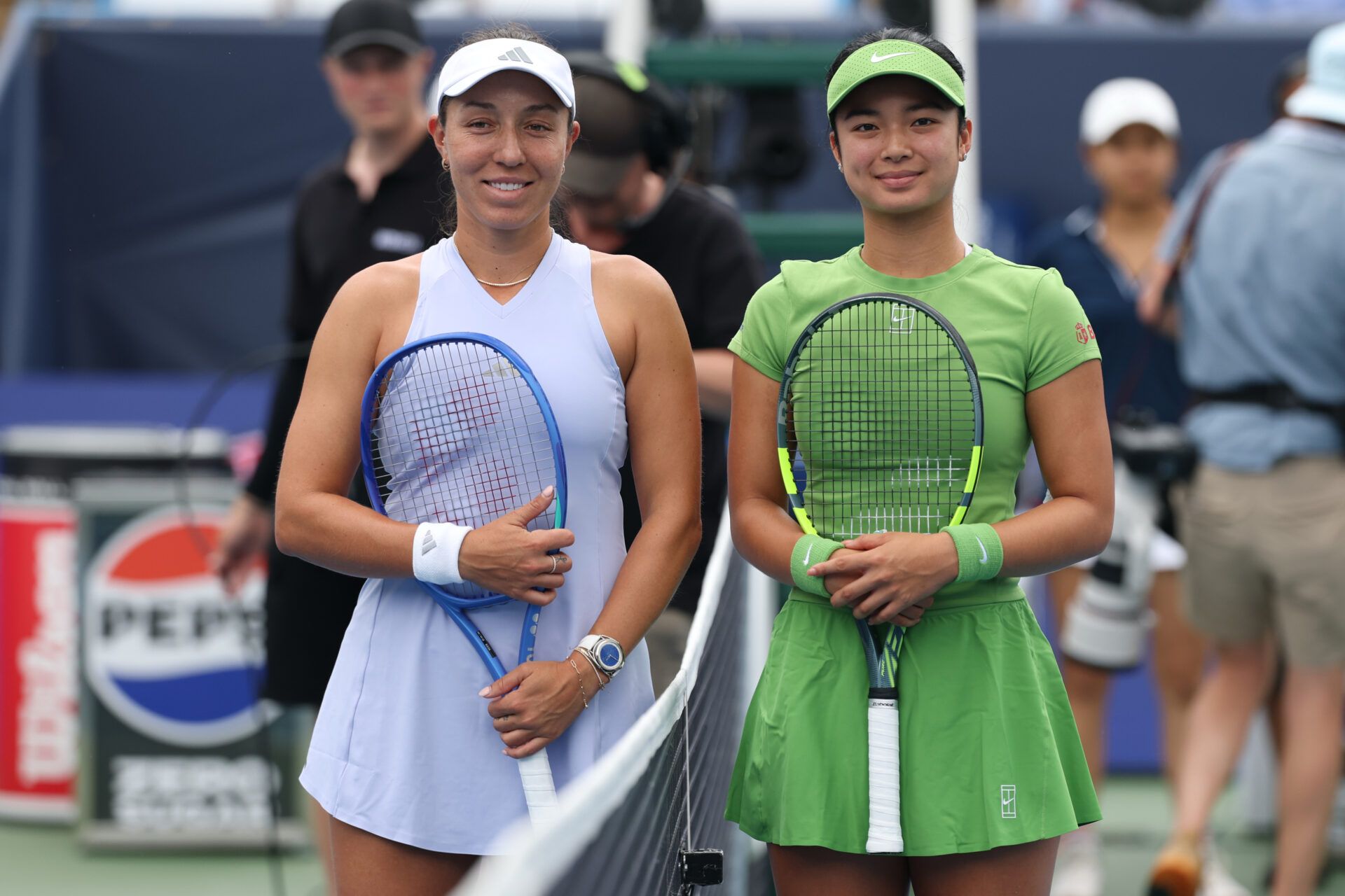 Jessica Pegula (USA) (L) and Alexandra Eala (PHI) (R) pose at the net prior to their women's singles final of the 2026 Mubadala DC Open at Rock Creek Park Tennis Center.