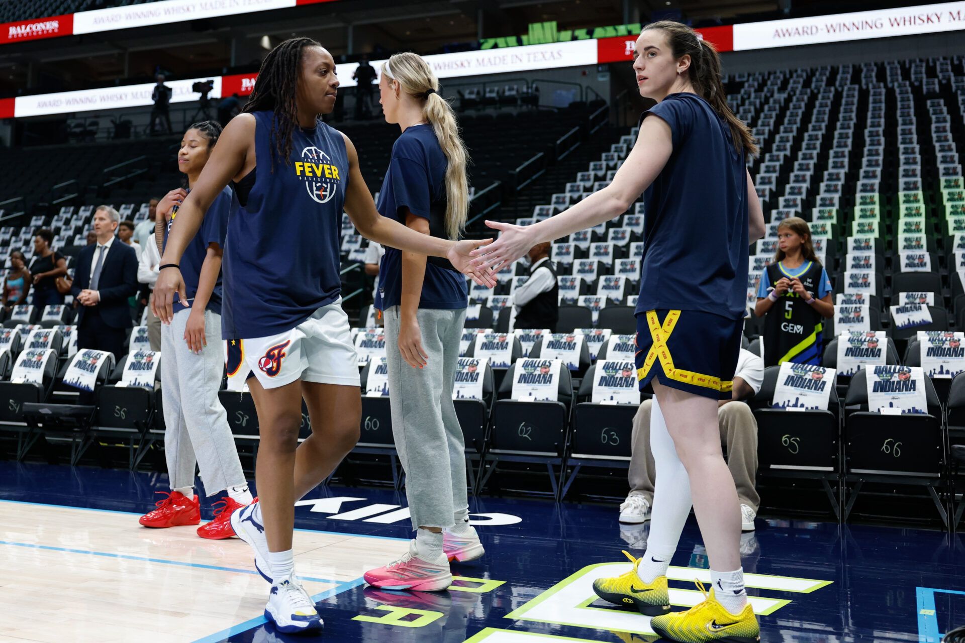 Indiana Fever guard Kelsey Mitchell (0) and guard Caitlin Clark (22) during warmups before the game against the Dallas Wings at American Airlines Center.