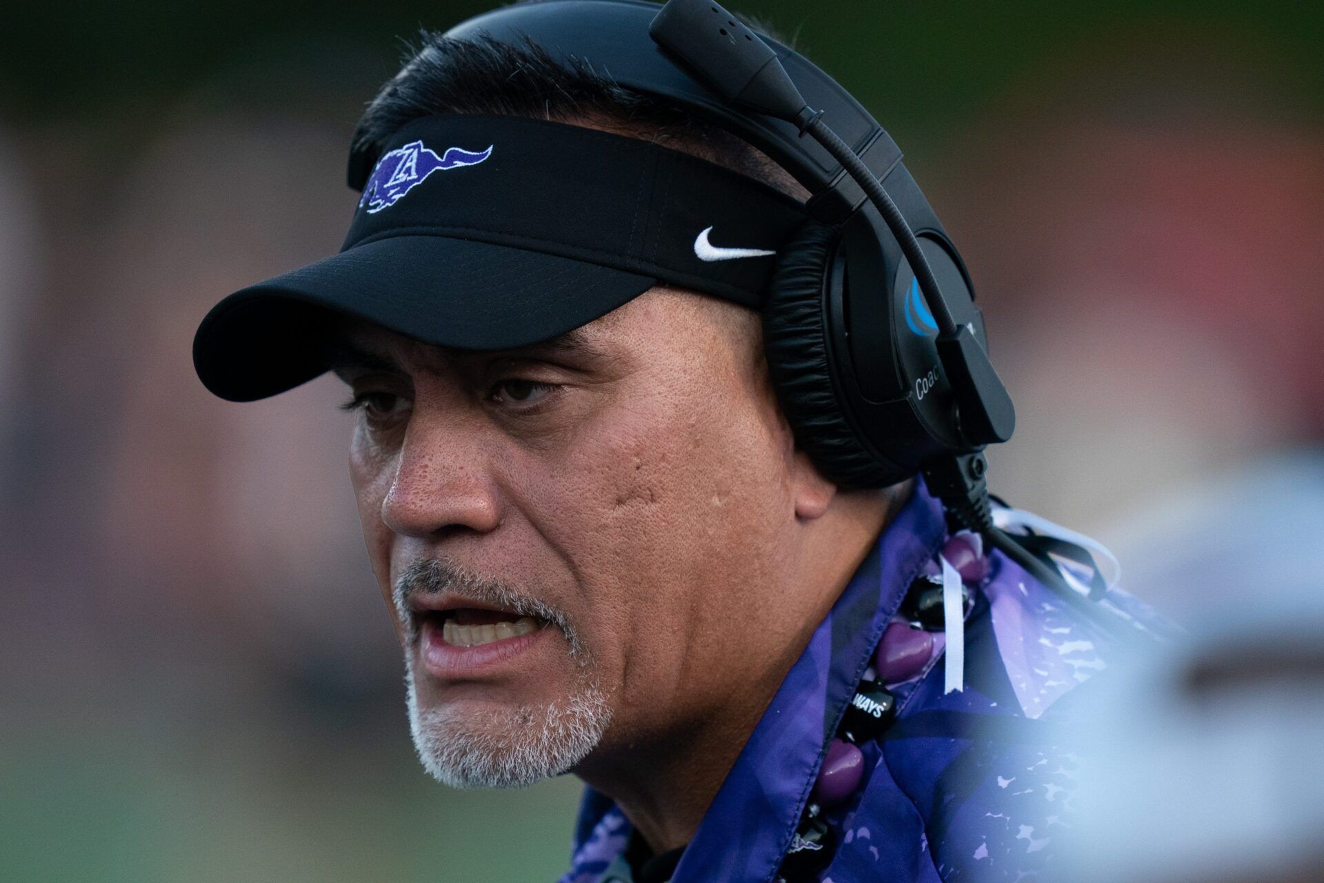 Lipscomb Head Coach Kevin Mawae works the sideline against IMG at Lipscomb's Reese Smith Football Field in Nashville, Tenn., Friday night, Aug. 18, 2023. IMG went on to win the game 35-10.