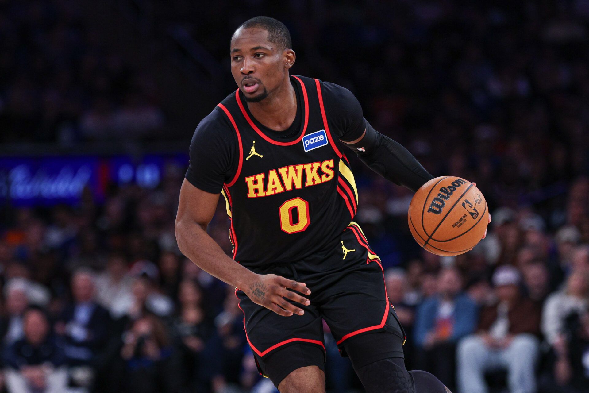 Atlanta Hawks forward Jonathan Kuminga (0) dribbles during the second half of the 2026 NBA Playoffs against the New York Knicks at Madison Square Garden.