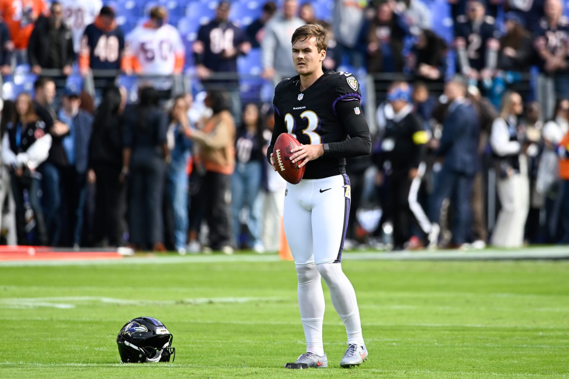 Baltimore Ravens place kicker Tyler Loop (33) warms up before the game against the Chicago Bears at M&T Bank Stadium.