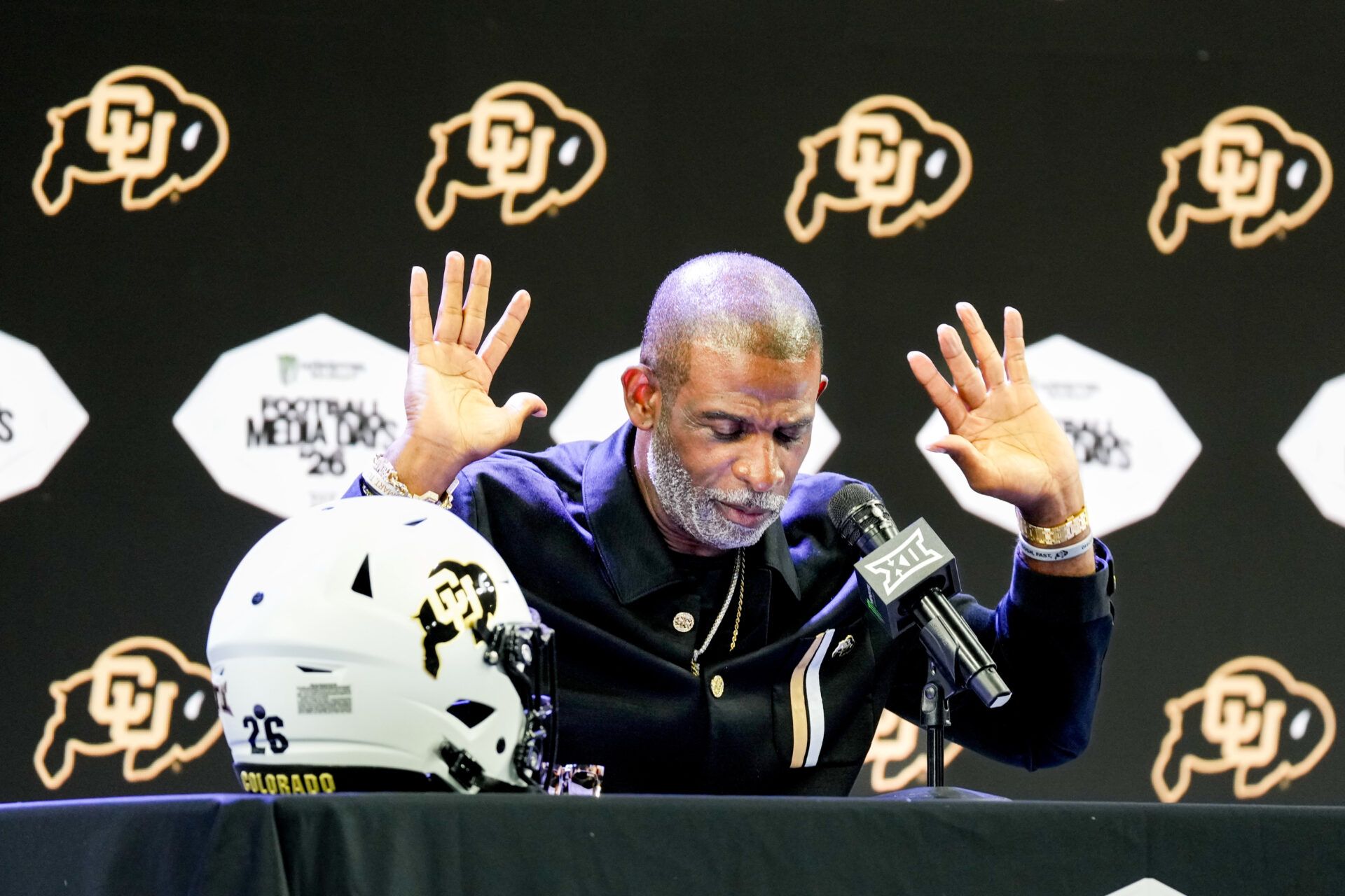 Colorado head coach Deion Sanders speaks to reporters during Big 12 Conference Football Media Days at The Star.