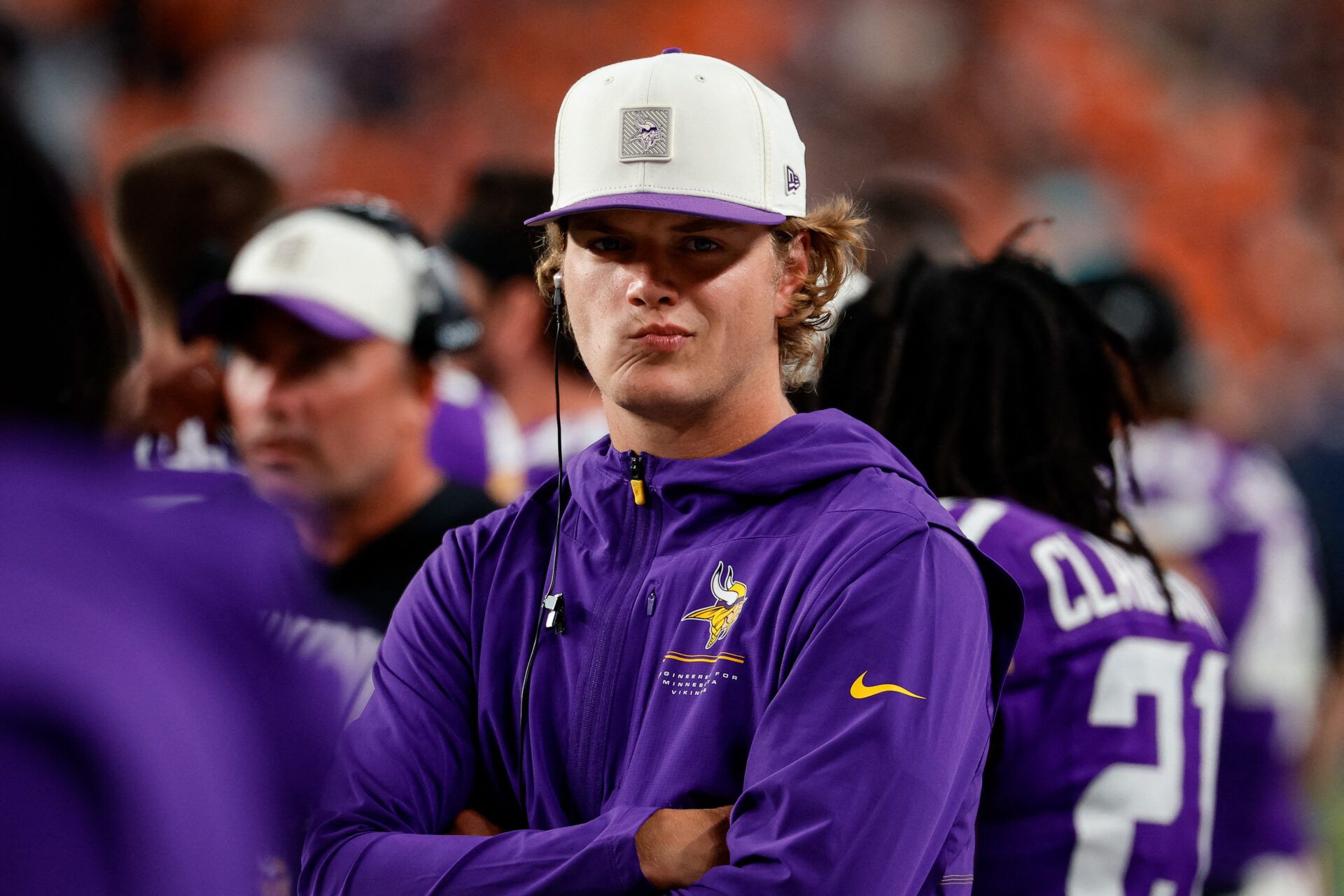 Minnesota Vikings quarterback J.J. McCarthy (9) looks on in the second quarter against the Denver Broncos at Empower Field at Mile High.
