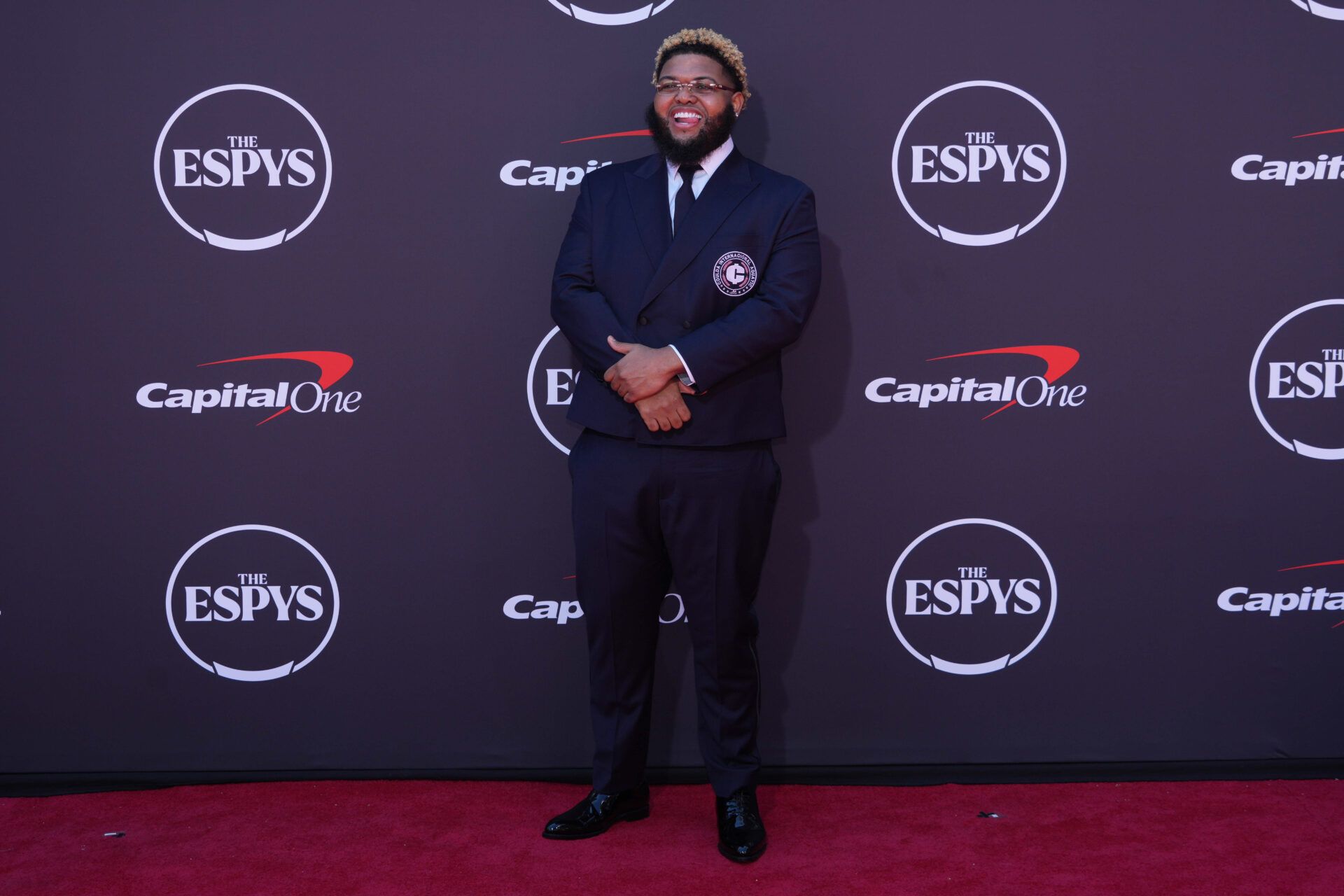Drew Desbordes aka Druski poses on the ESPYs red carpet at the Dolby Theatre.