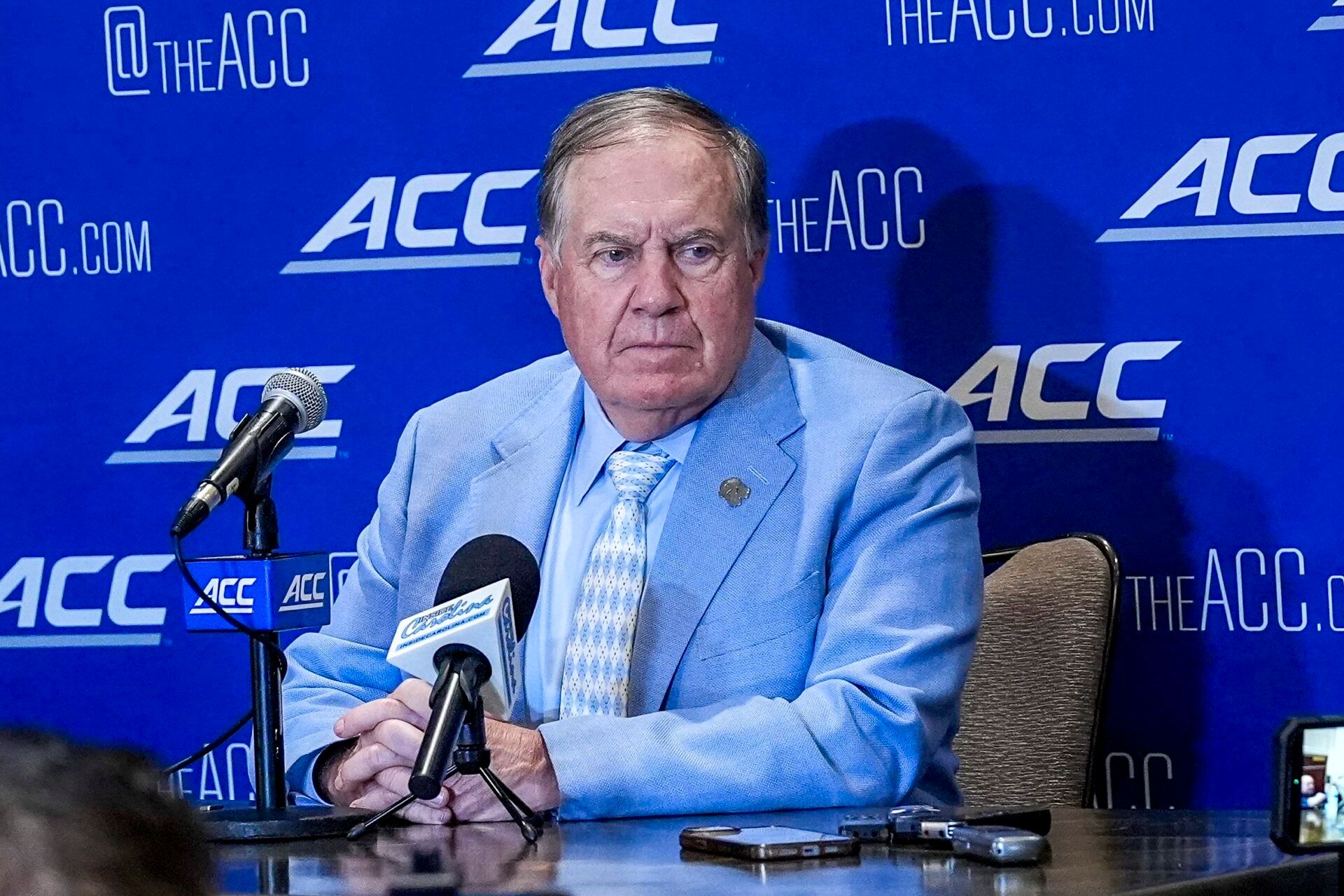 North Carolina head coach Bill Belichick, talks with the media during interviews at Hilton Charlotte Uptown.