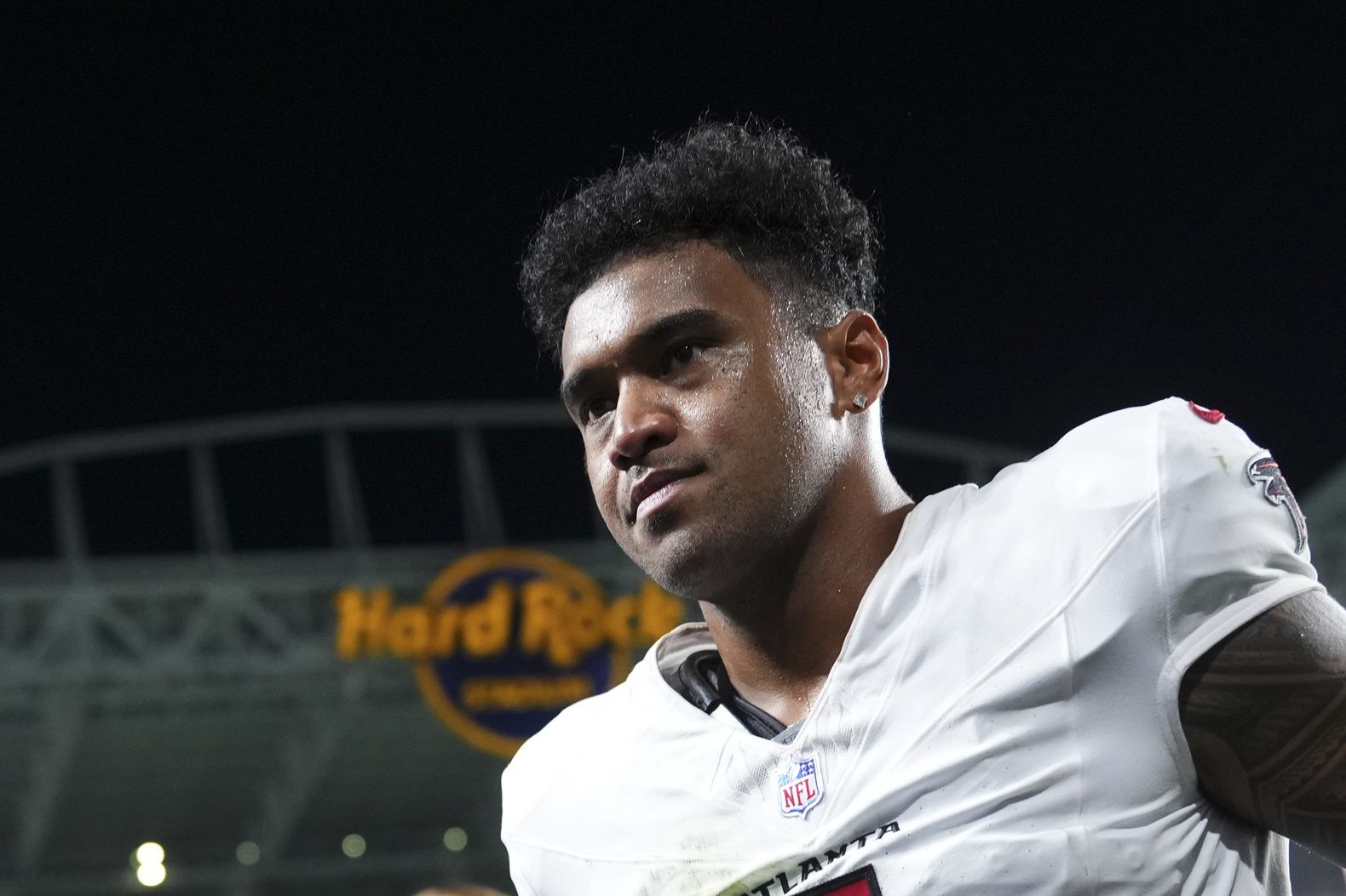 Atlanta Falcons quarterback Tua Tagovailoa (1) leaves the field at the end of a pre season game against the Miami Dolphins at Hard Rock Stadium.