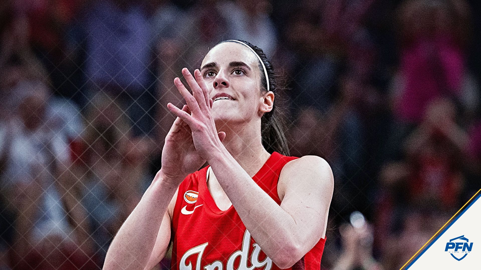 Indiana Fever guard Caitlin Clark (22) celebrates a made basket in the first half against the Connecticut Sun at Gainbridge Fieldhouse.