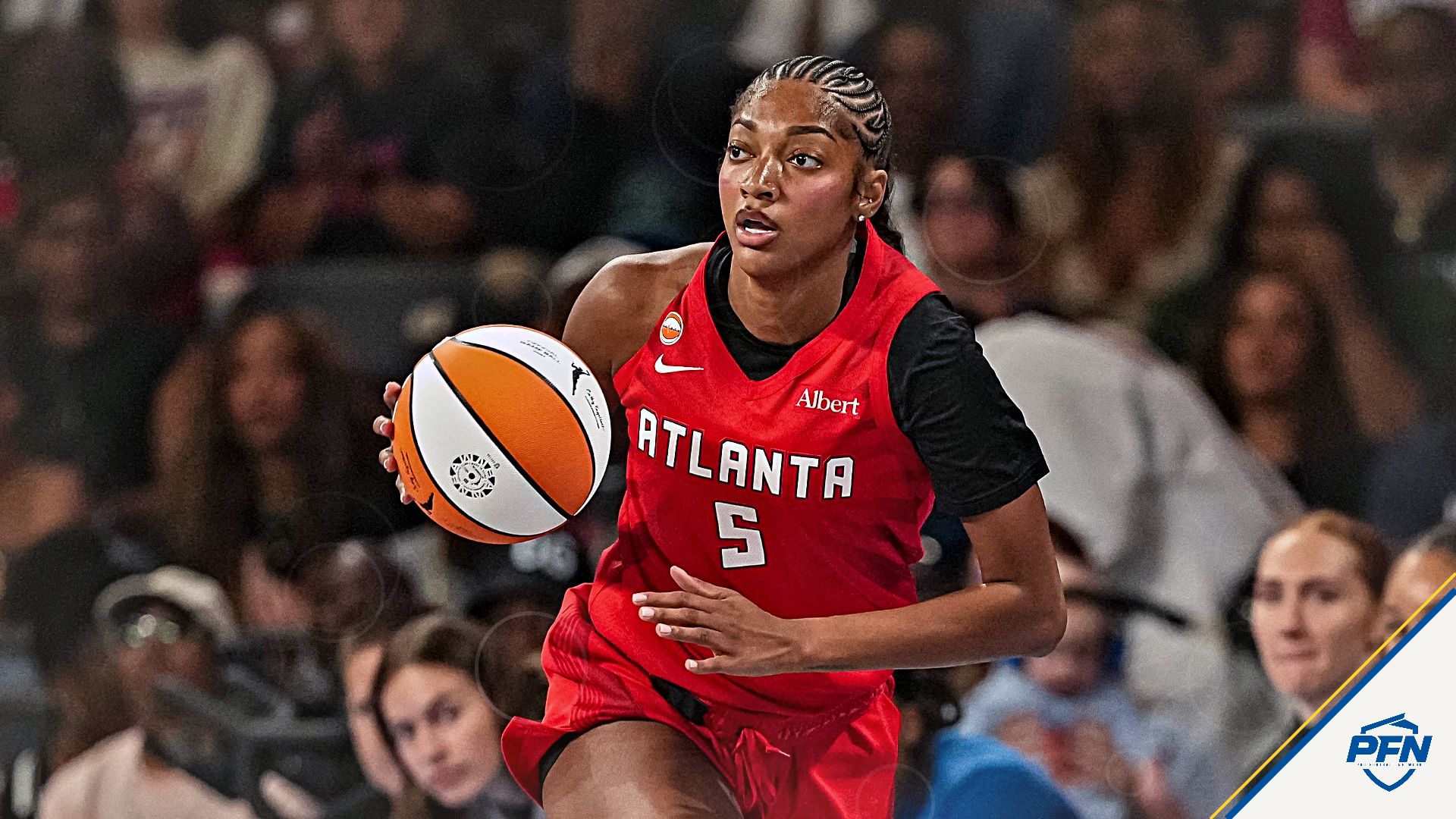 Atlanta Dream forward Angel Reese (5) controls the ball against the Minnesota Lynx during the first half at Gateway Center Arena at College Park.