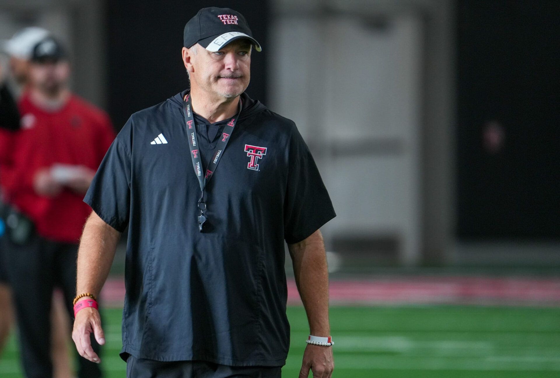 Texas Tech head coach Joey McGuire walks the field during football practice, Wednesday, Aug. 5, 2026, at the Womble Football Center.