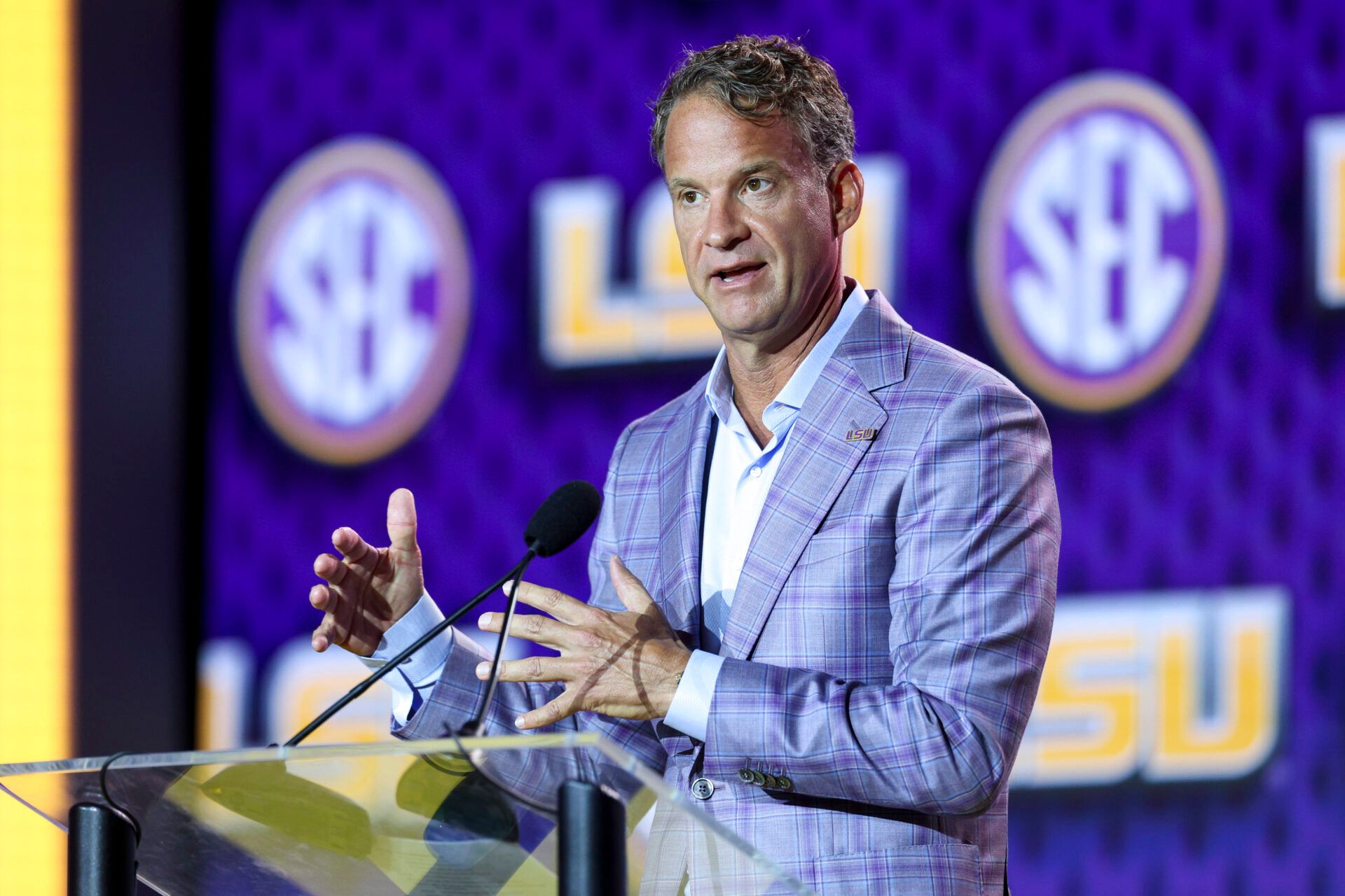 LSU Tigers head coach Lane Kiffin speaks to the press during SEC Football Kickoff Media Day at the Tampa Marriott.